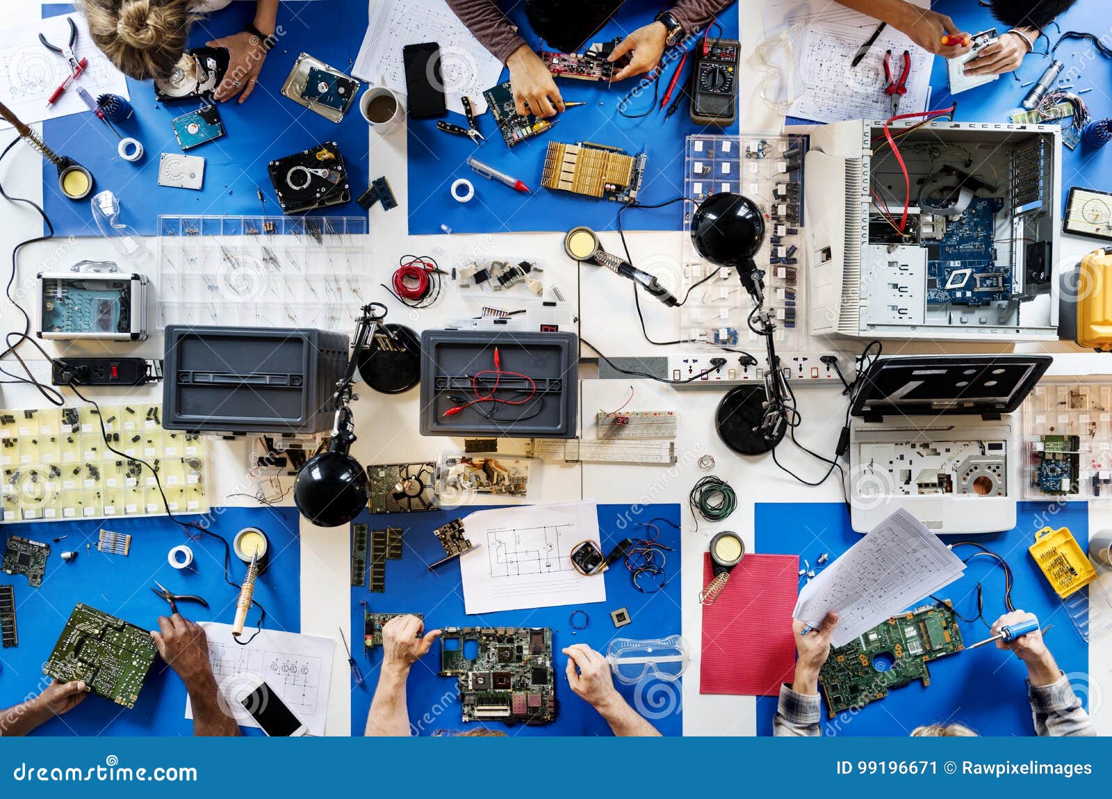 Aerial View of Electronics Technicians Team Working Stock Image Image