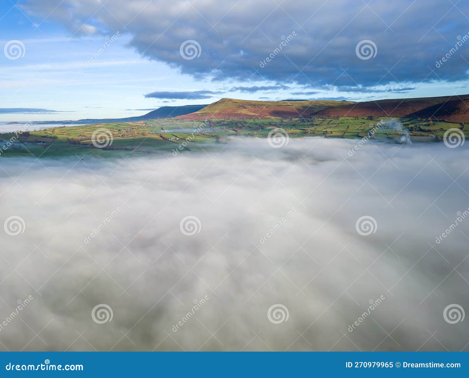 aerial view of fog caused by a temperature inversion over a rural farming area