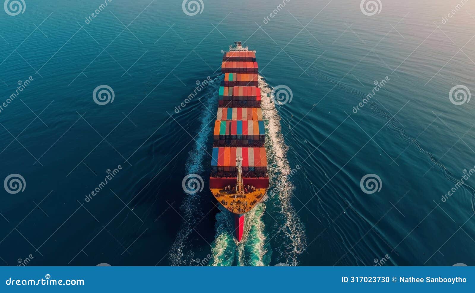 aerial view of a fully laden cargo ship at sea