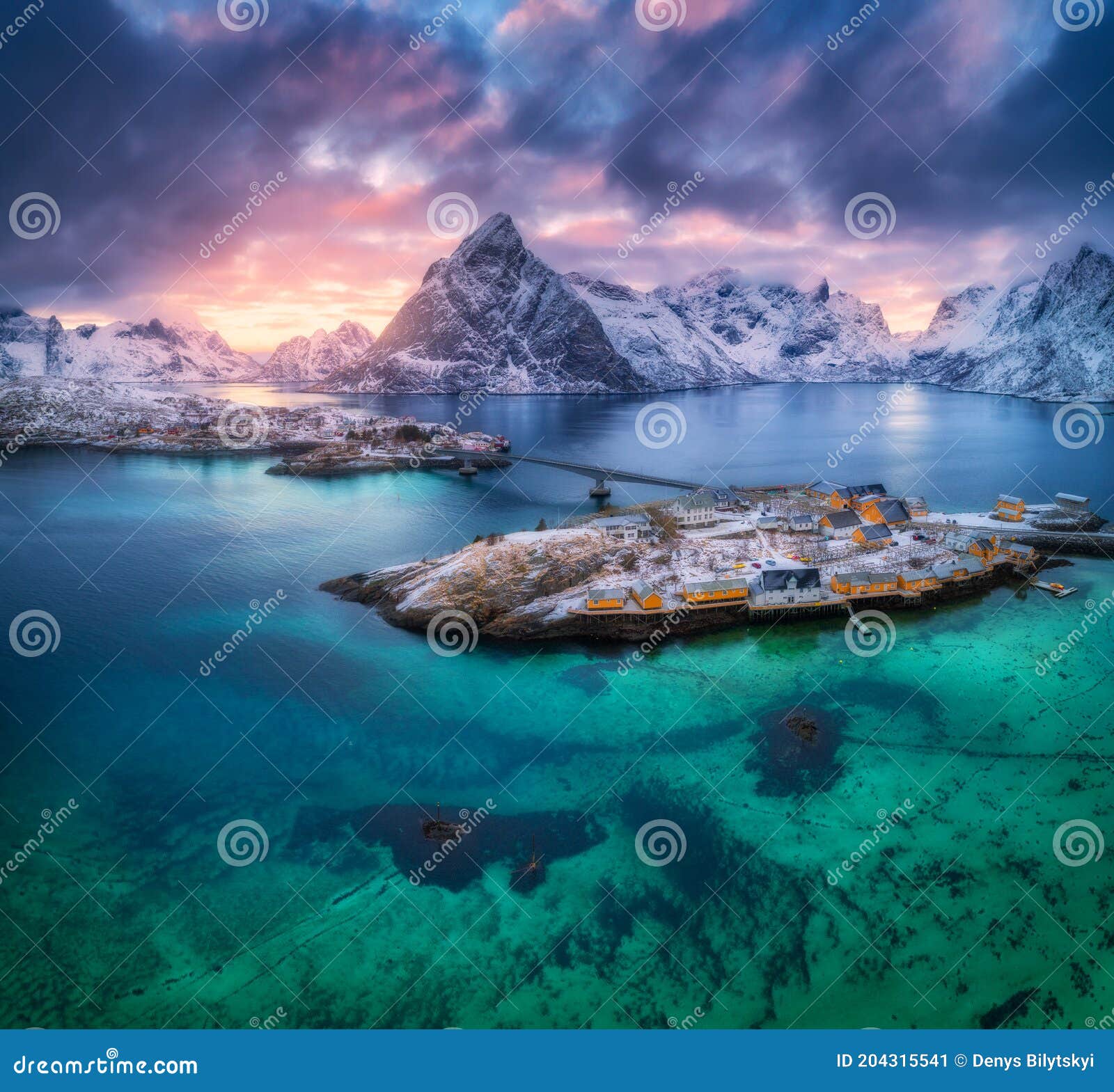 aerial view of hamnoy at dramatic sunset in winter in norway