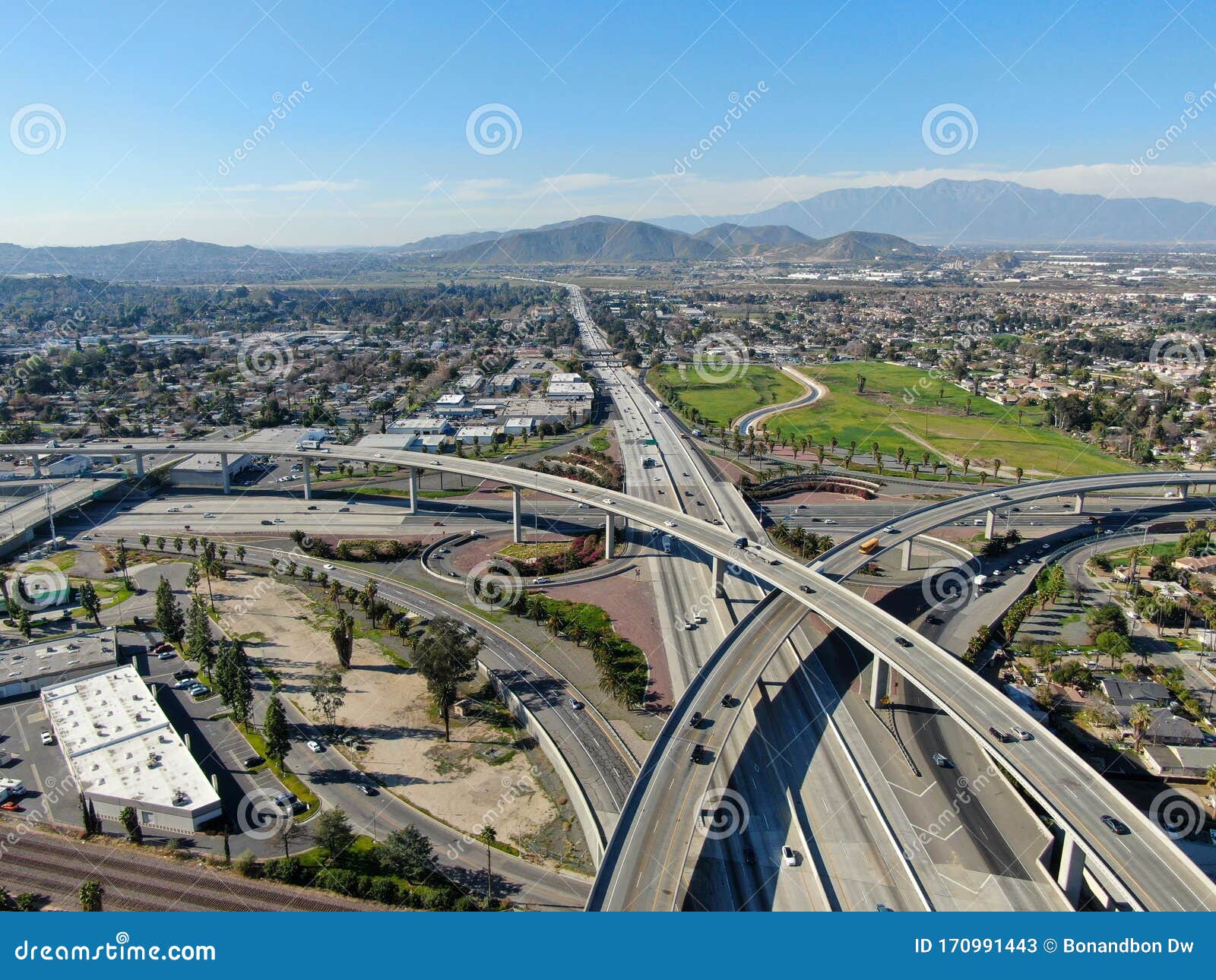 aerial view of highway interchange and junction in riverside, california.