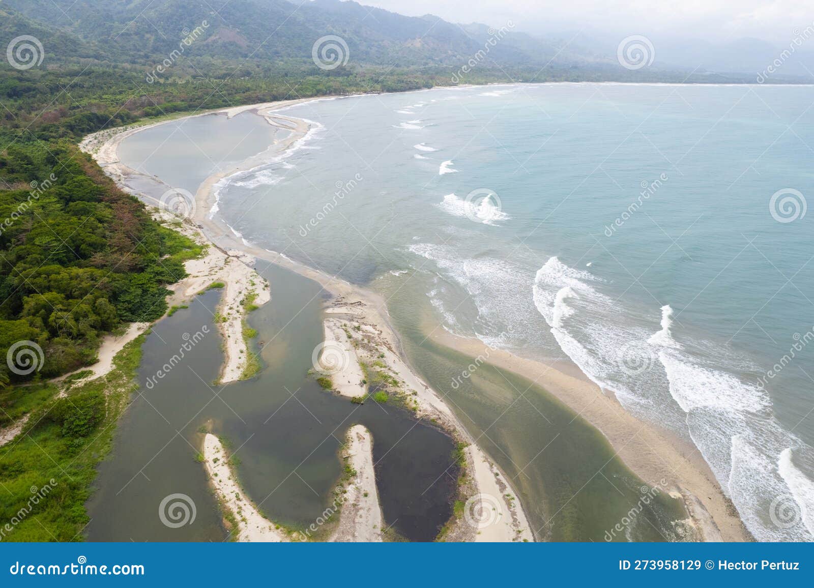 aerial view between the junction of the river and the sea