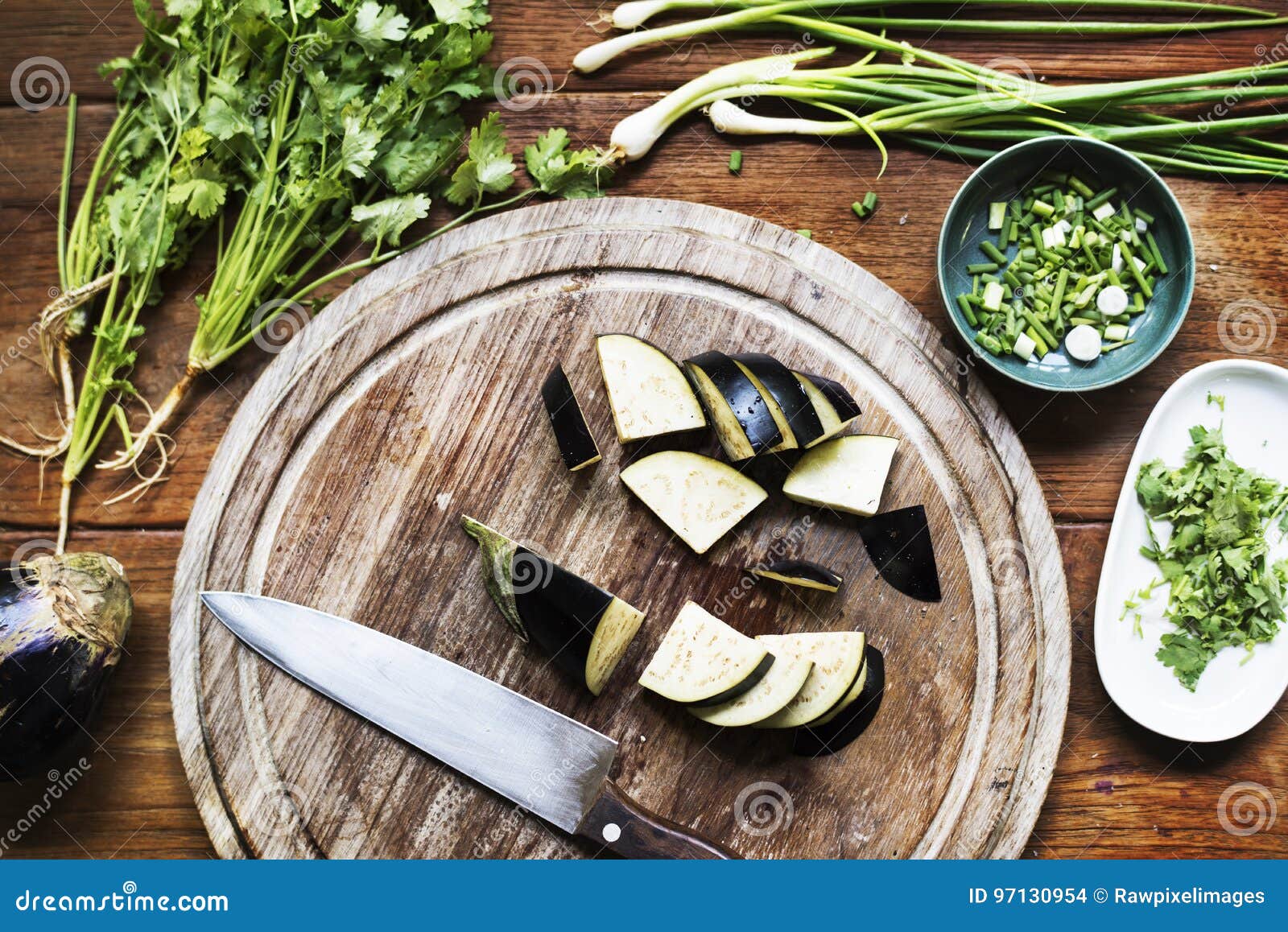 Aerial View of Knife with Fresh Cut Organic Eggplant Vegetable Stock