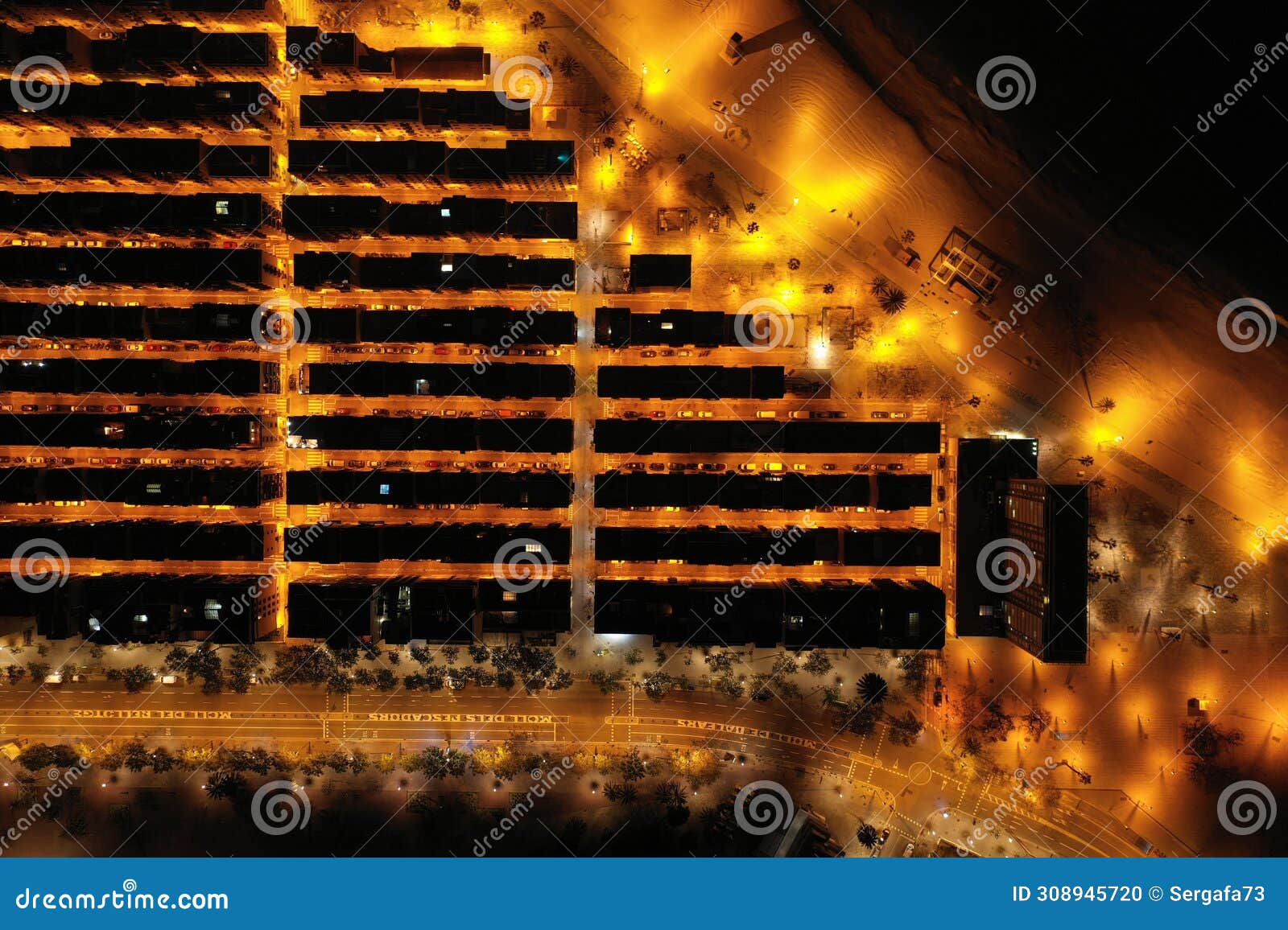 aerial view from la barceloneta beach and houses at night. zenital view