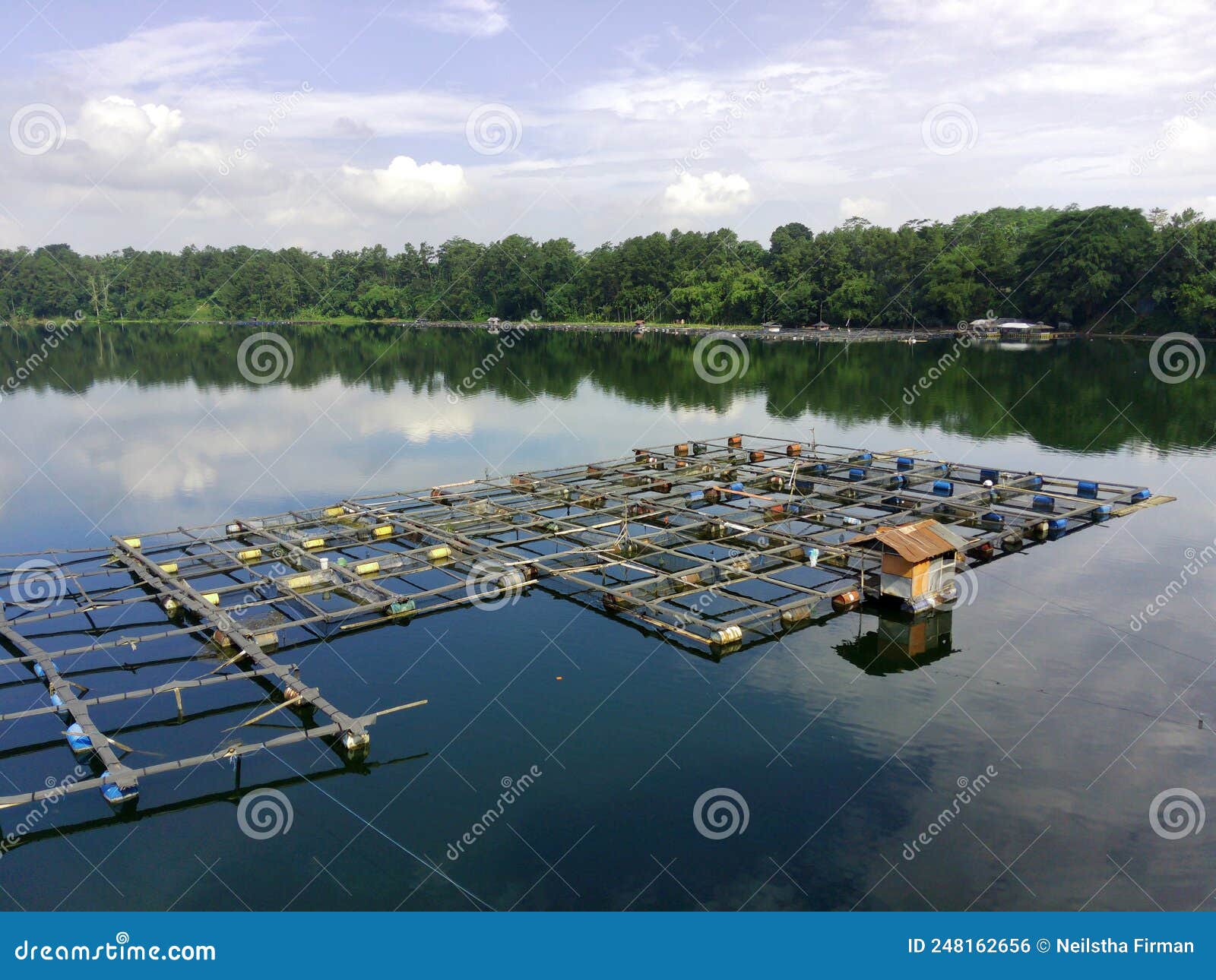 aerial view of the lake with traditional floating fish cages