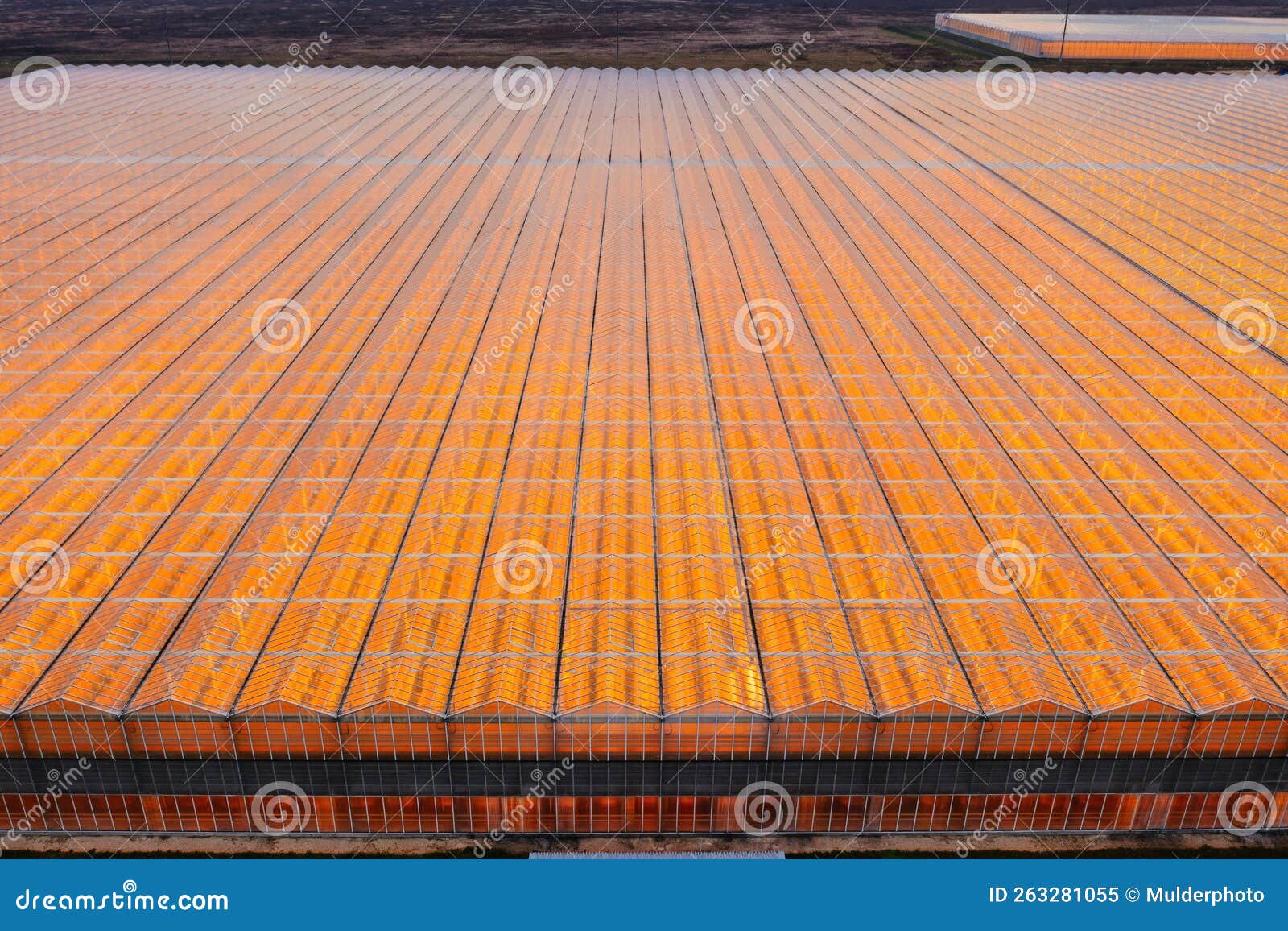 Aerial View of Large Modern Glass Greenhouse Complex Stock Image