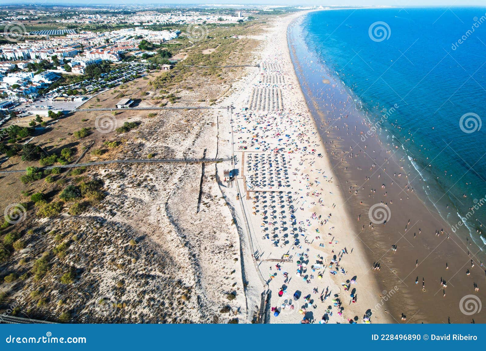 aerial view of manta rota beach, which is part of a long sweep of fine sand
