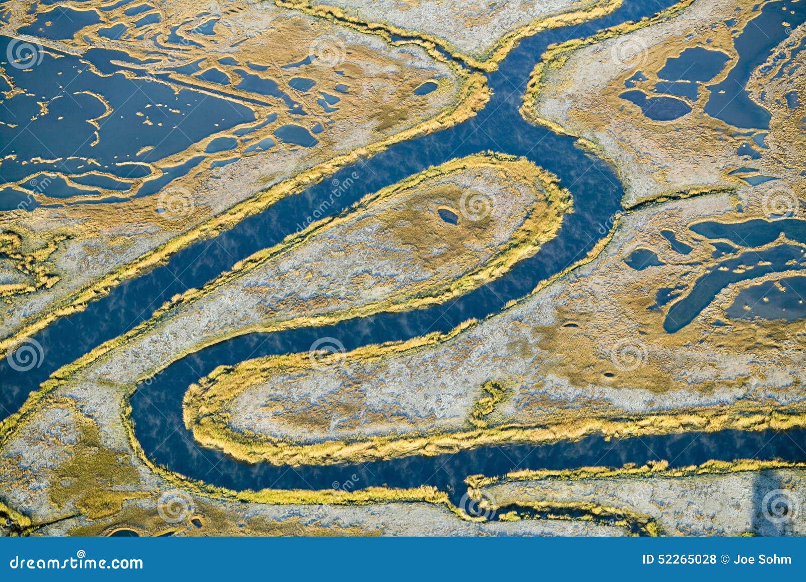aerial view of marsh, wetland abstraction of salt and seawater, and rachel carson wildlife sanctuary in wells, maine