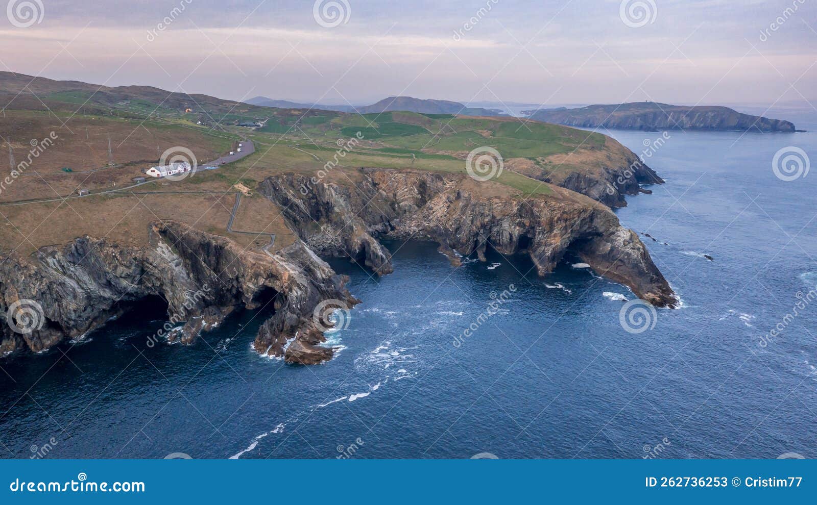 aerial view with mizen head lighthouse with spectaculars cliffs in west cork ireland