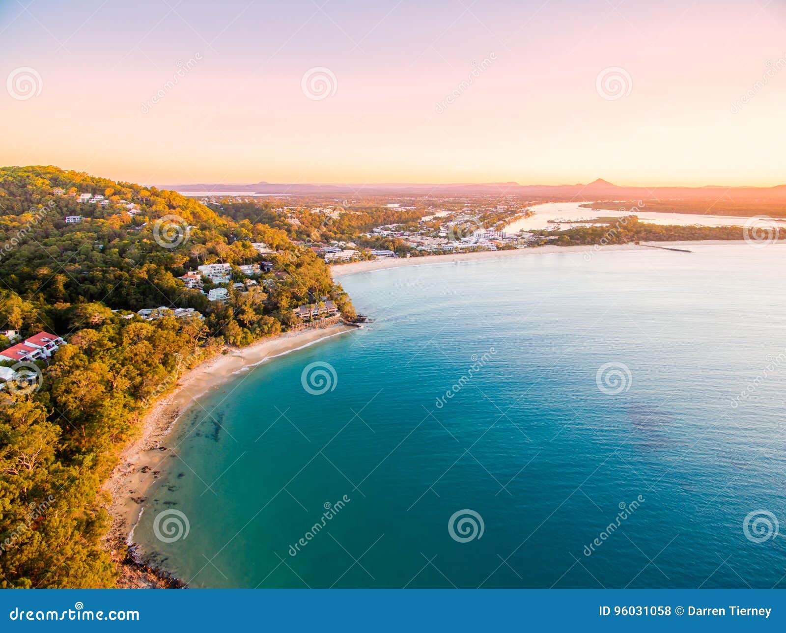 an aerial view of noosa national park at sunset in queensland australia