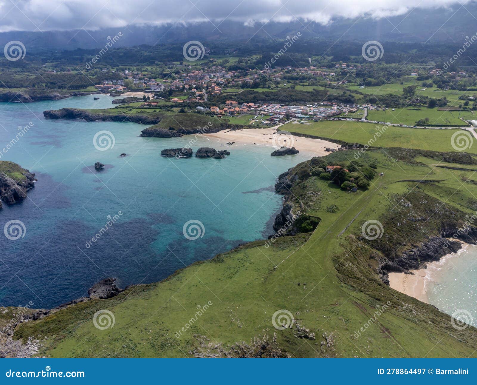 aerial view on playa de palombina, las camaras and celorio, green coast of asturias, north spain with sandy beaches, cliffs,