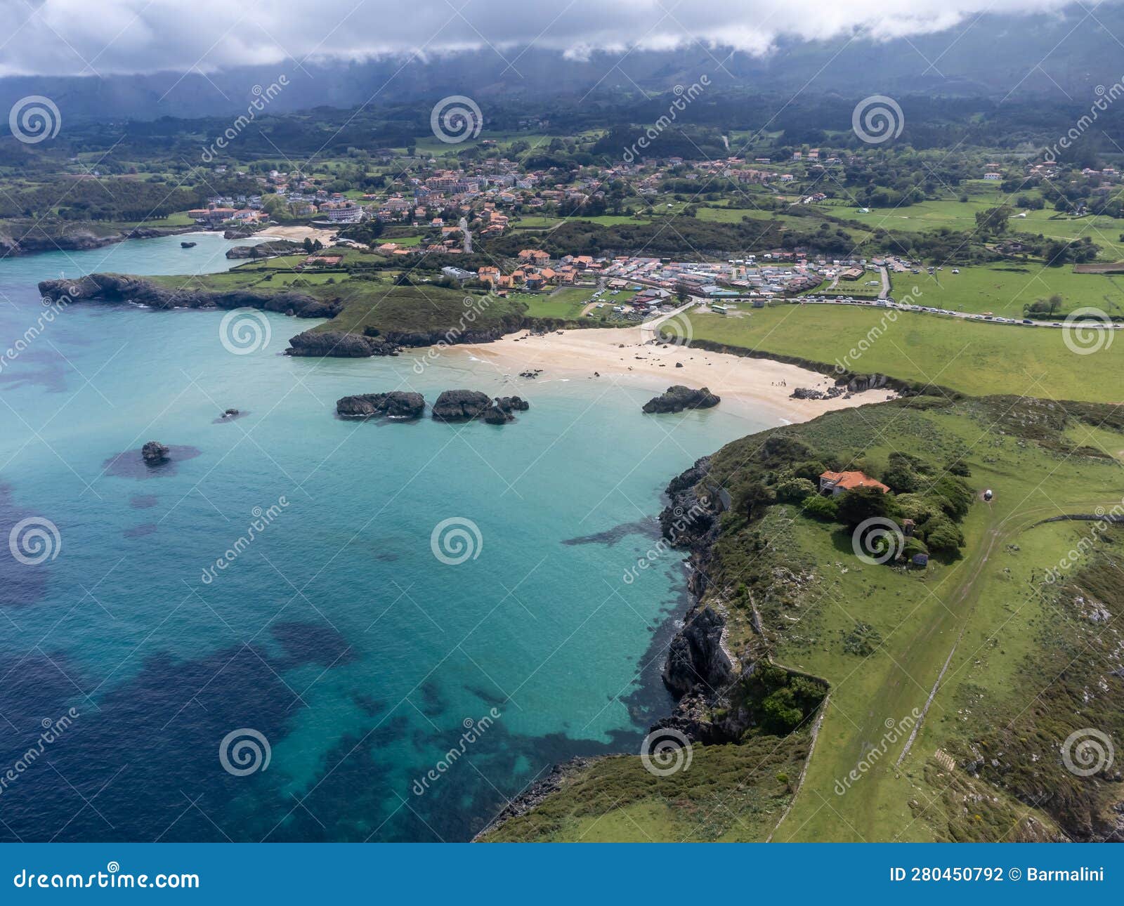 aerial view on playa de palombina, las camaras and celorio, green coast of asturias, north spain with sandy beaches, cliffs,