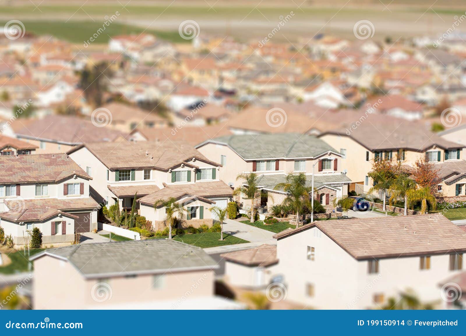 aerial view of populated neigborhood of houses with tilt-shift blur