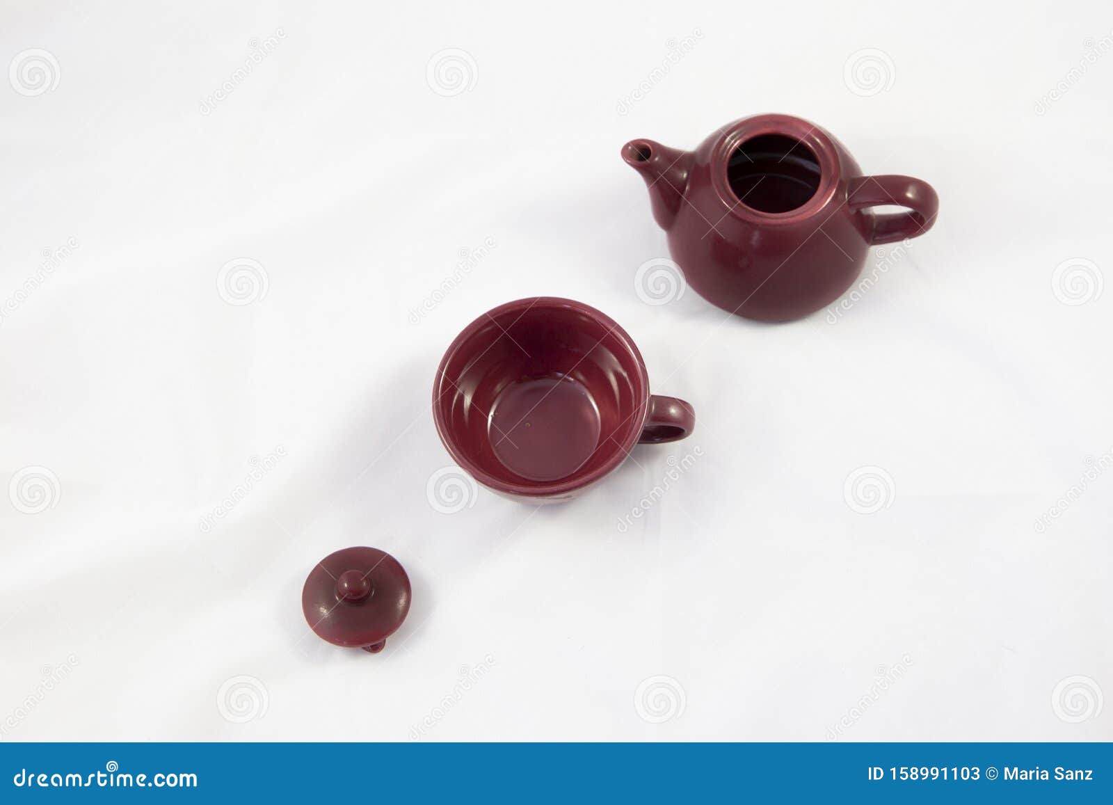 aerial view of a porcelain teapot on white background.