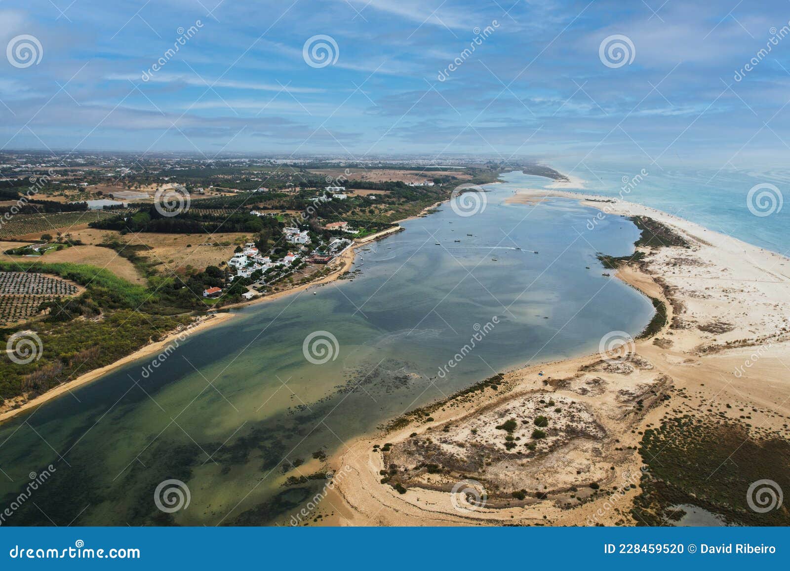 aerial view of praia da fabrica, also known as praia de cacela velha beach, a sandy barrier island at the mouth of the ria formosa