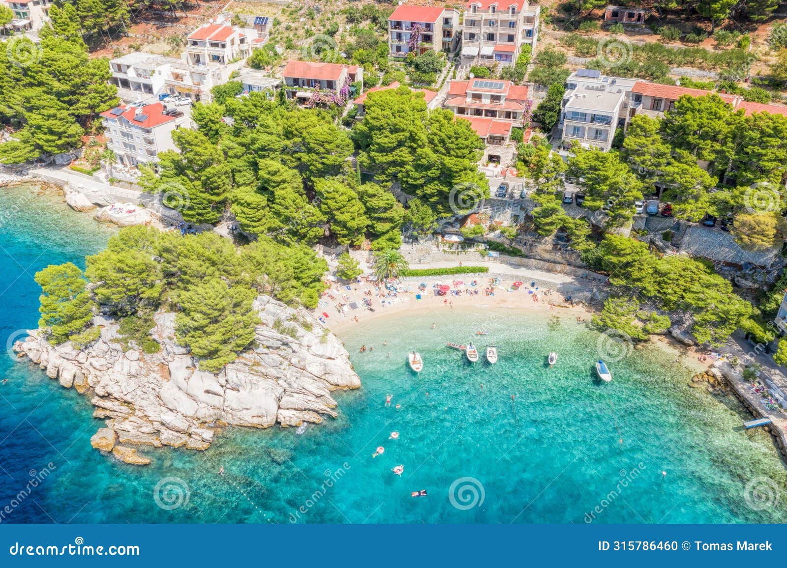 aerial view of punta rata beach with boats and azure sea in brela, croatia, dalmatia, croatian azure coast