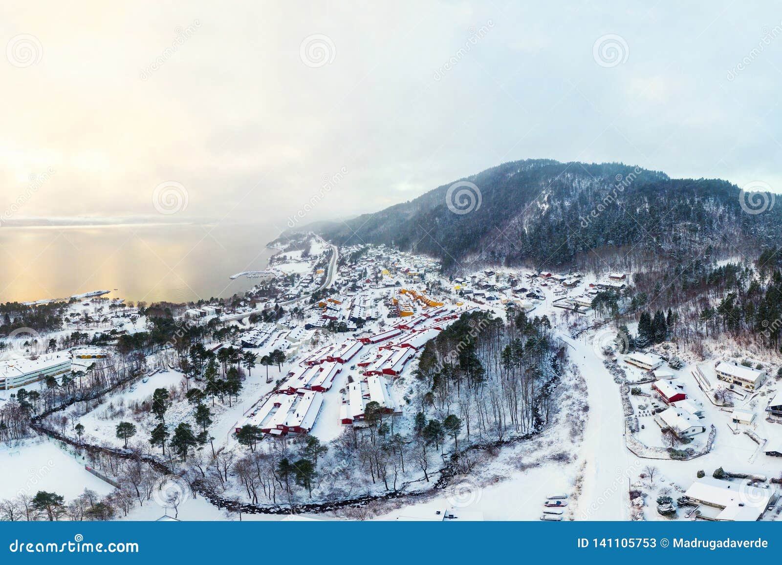 aerial view of residential area in molde, norway during a cloudy day in winter