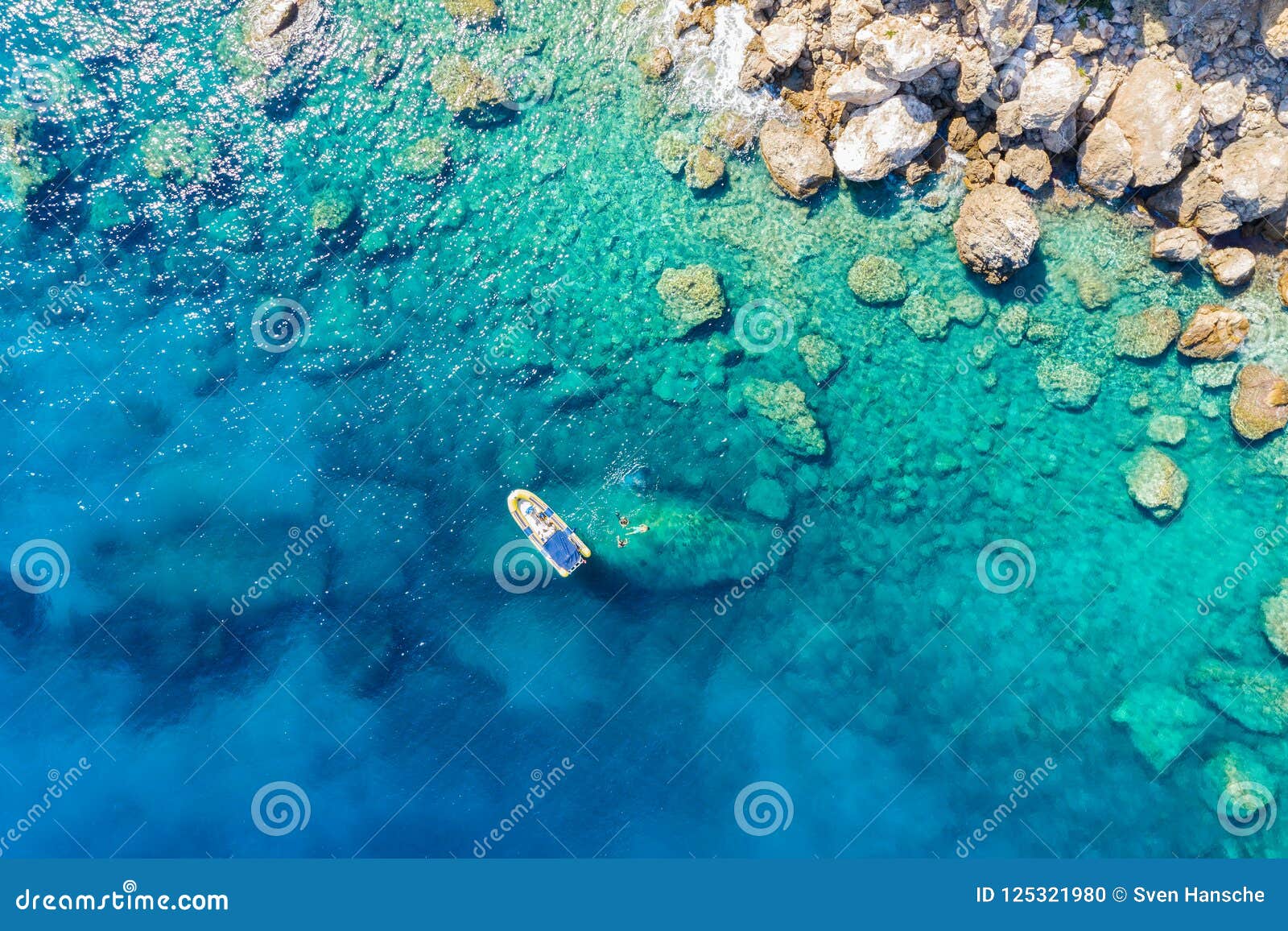 aerial view of a rib boat with snorkelers and divers in greece