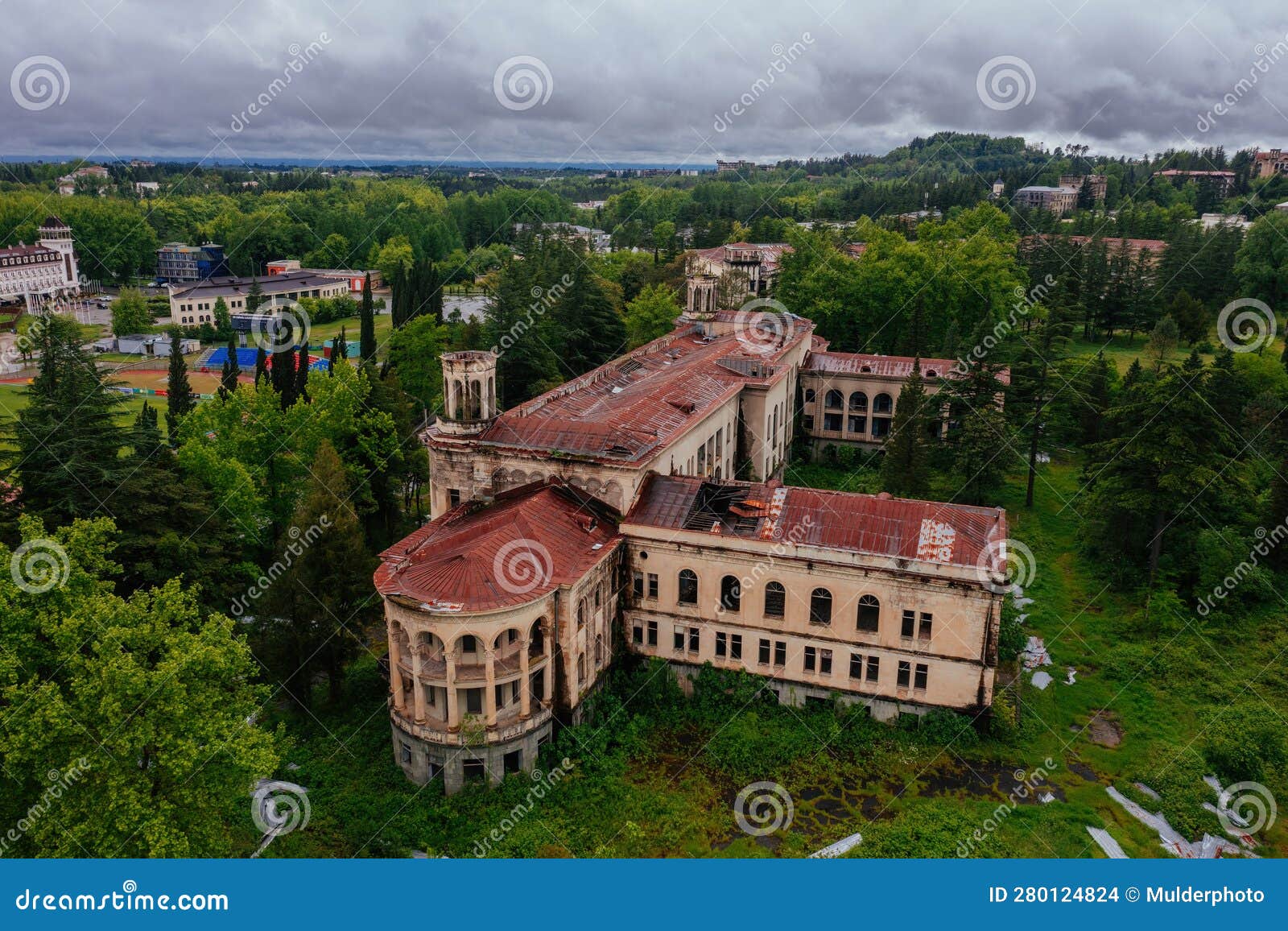 aerial view of ruined overgrown old abandoned soviet sanatorium iberia, tskaltubo, georgia