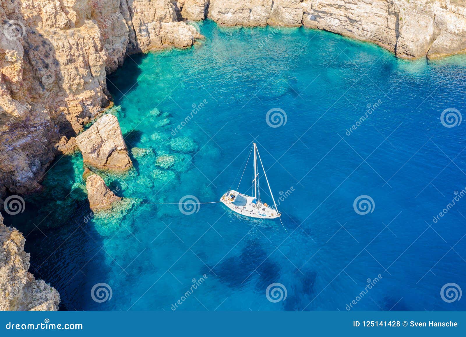 aerial view of a sailing boat in the aegean sea, greece
