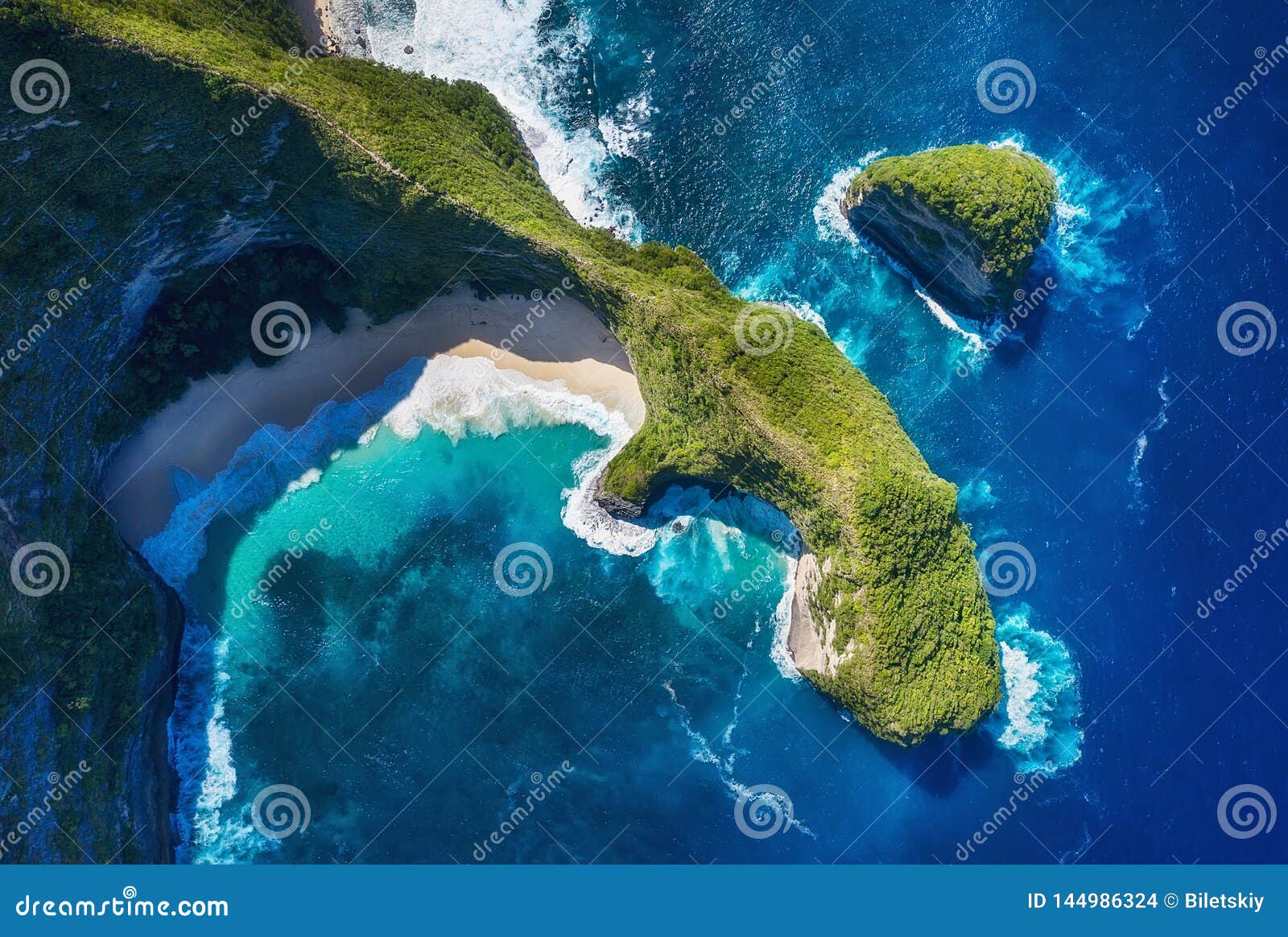 aerial view at sea and rocks. turquoise water background from top view. summer seascape from air. kelingking beach, nusa penida, b