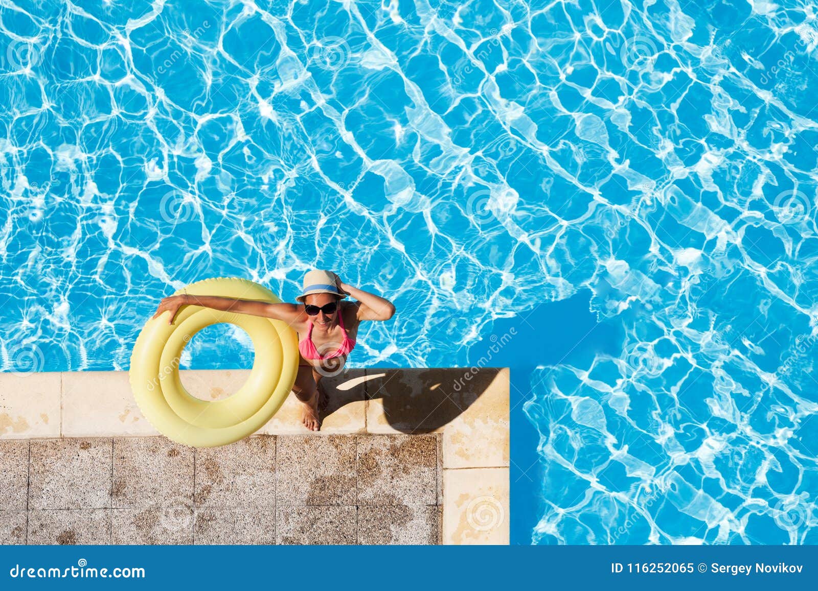 Happy Woman Standing at Poolside with Rubber Ring Stock Image - Image ...