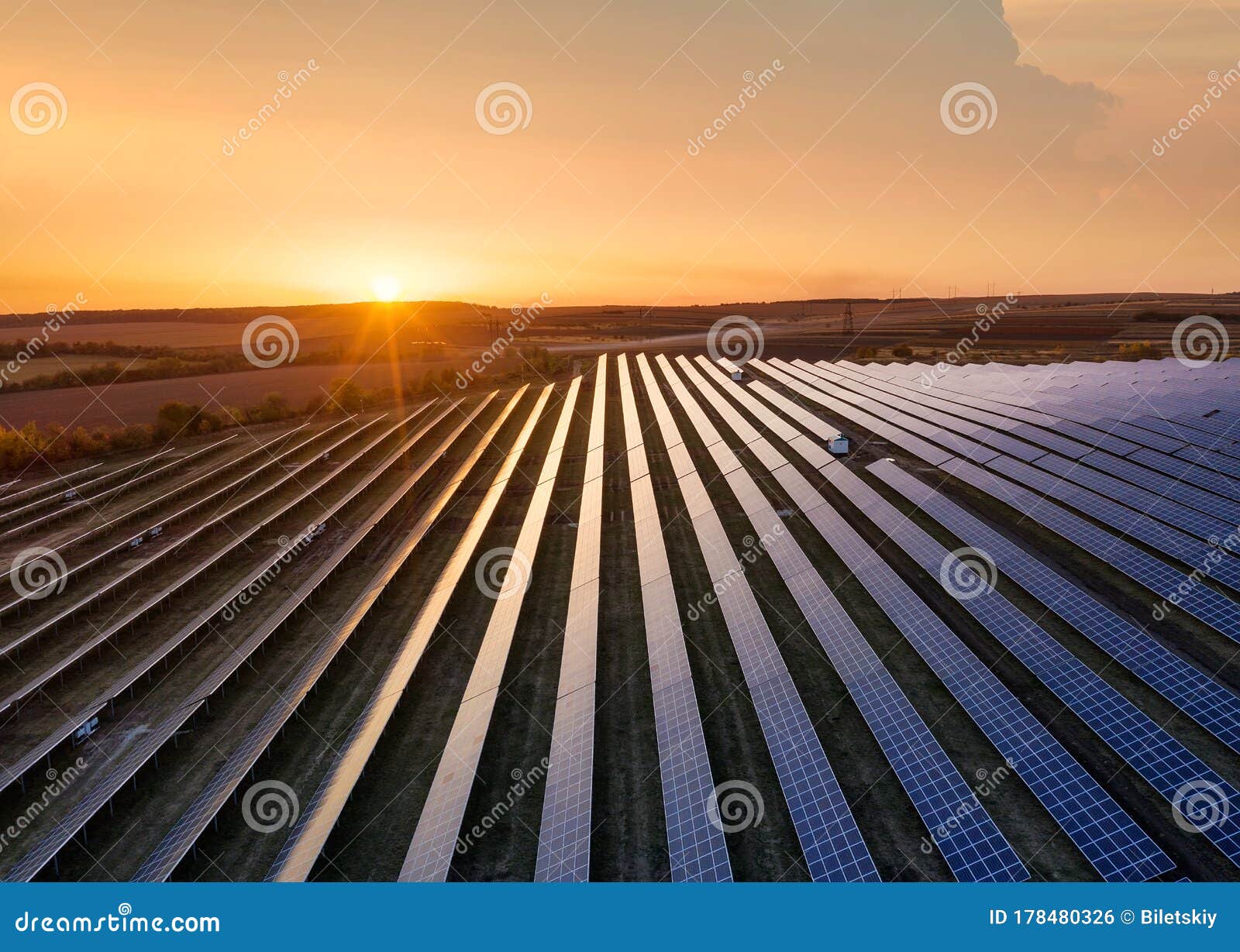 aerial view on the solar panel. technologies of renewable energy sources. view from air. industrial landscape during sunset.