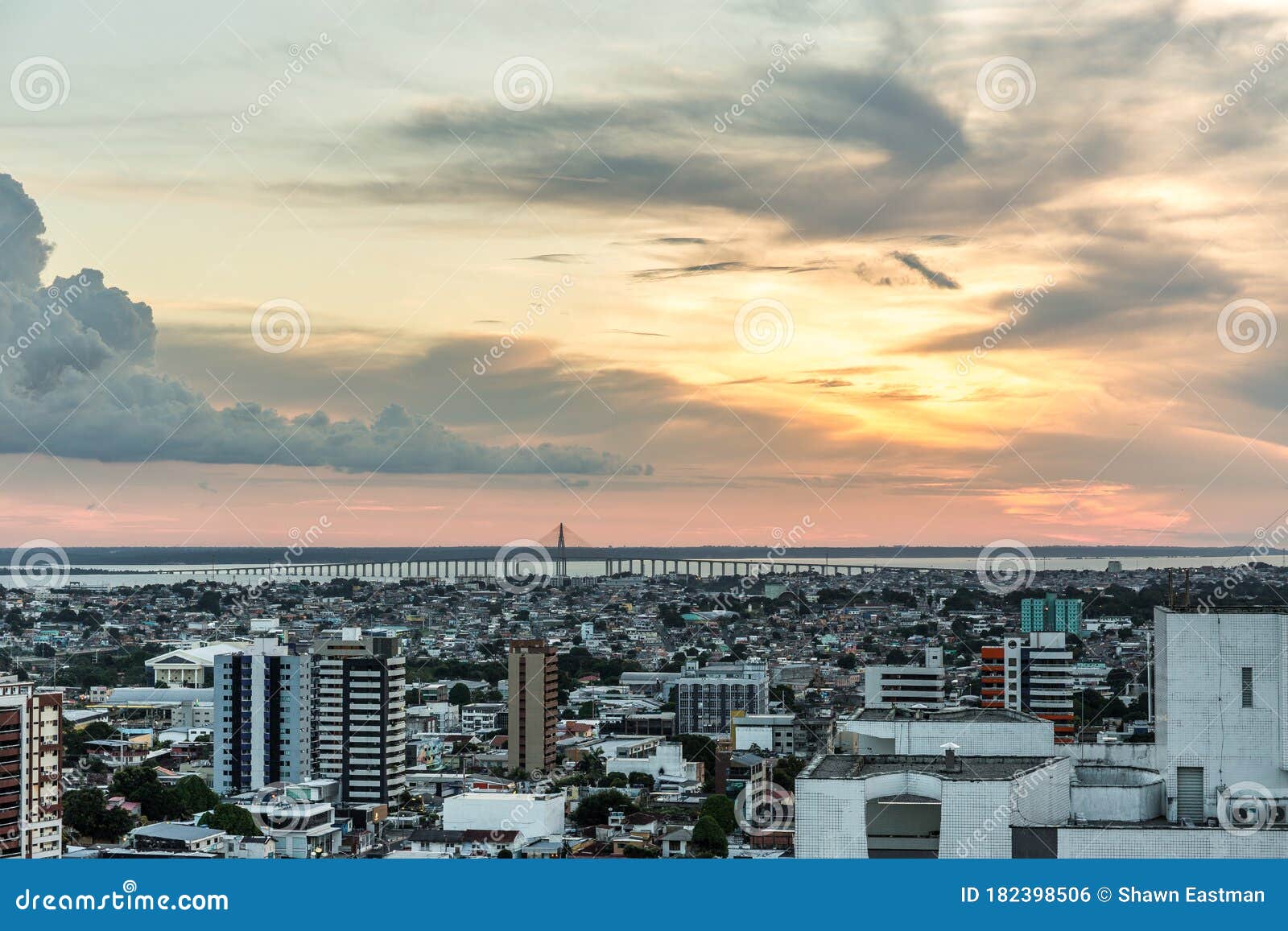 View Over the City of Manaus at Sunset with Rio Negra Bridge in