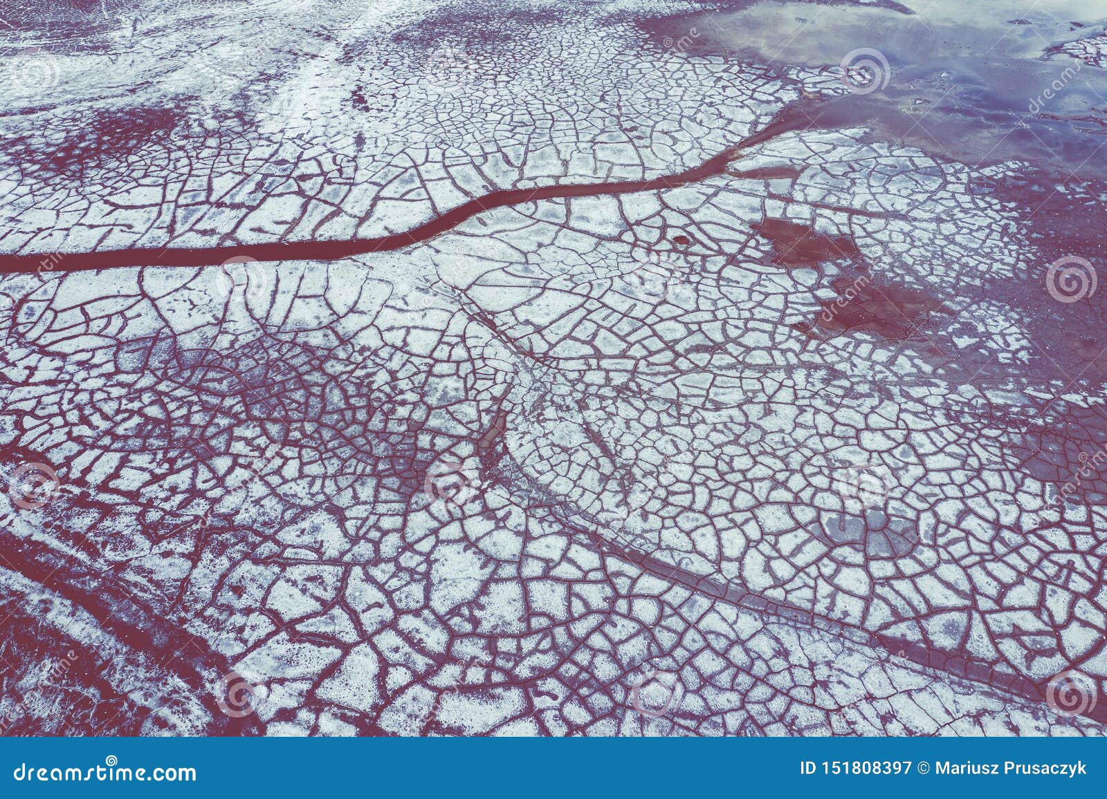 aerial view of surrealistic industrial place. dry surface. desertic landscape. human impact on the environment. view from above.