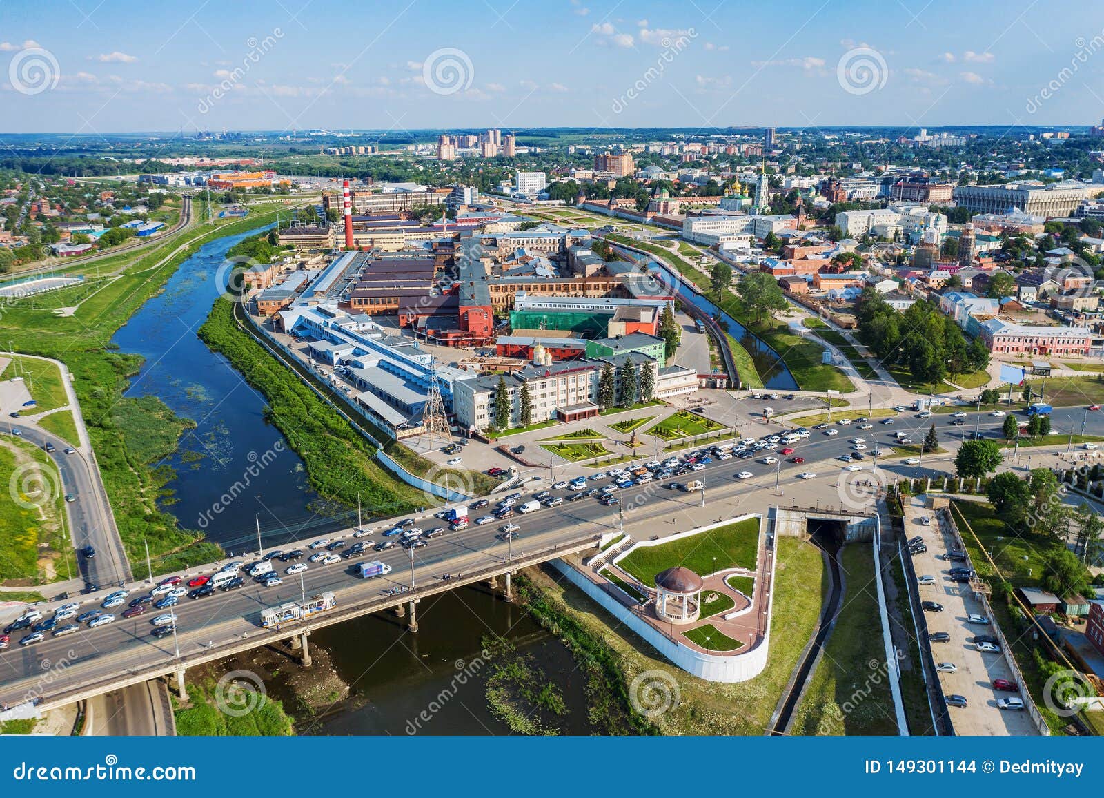 aerial view of tula city center or downtown with bridge over river upa, modern and historic buildings, factories and car traffic