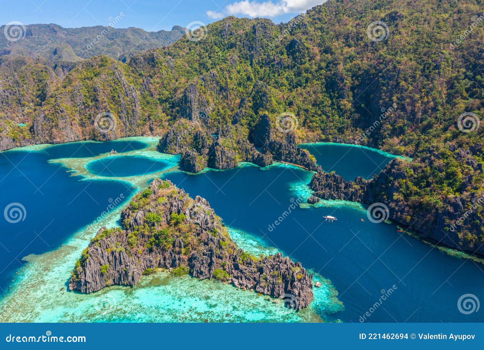 aerial view of turquoise tropical lagoon with limestone cliffs in coron island, palawan, philippines. unesco world