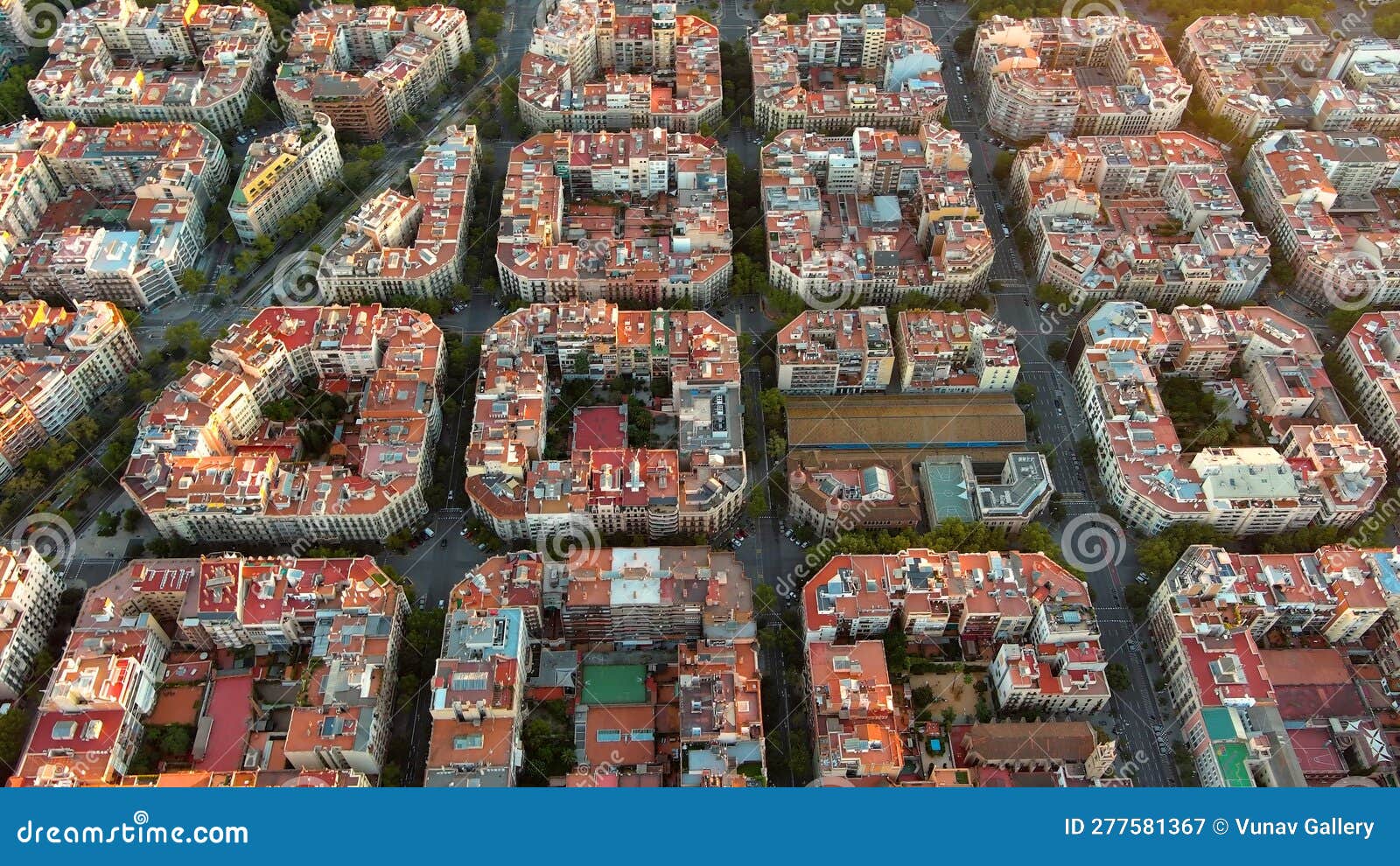 aerial view of typical buildings of barcelona cityscape. eixample urban grid