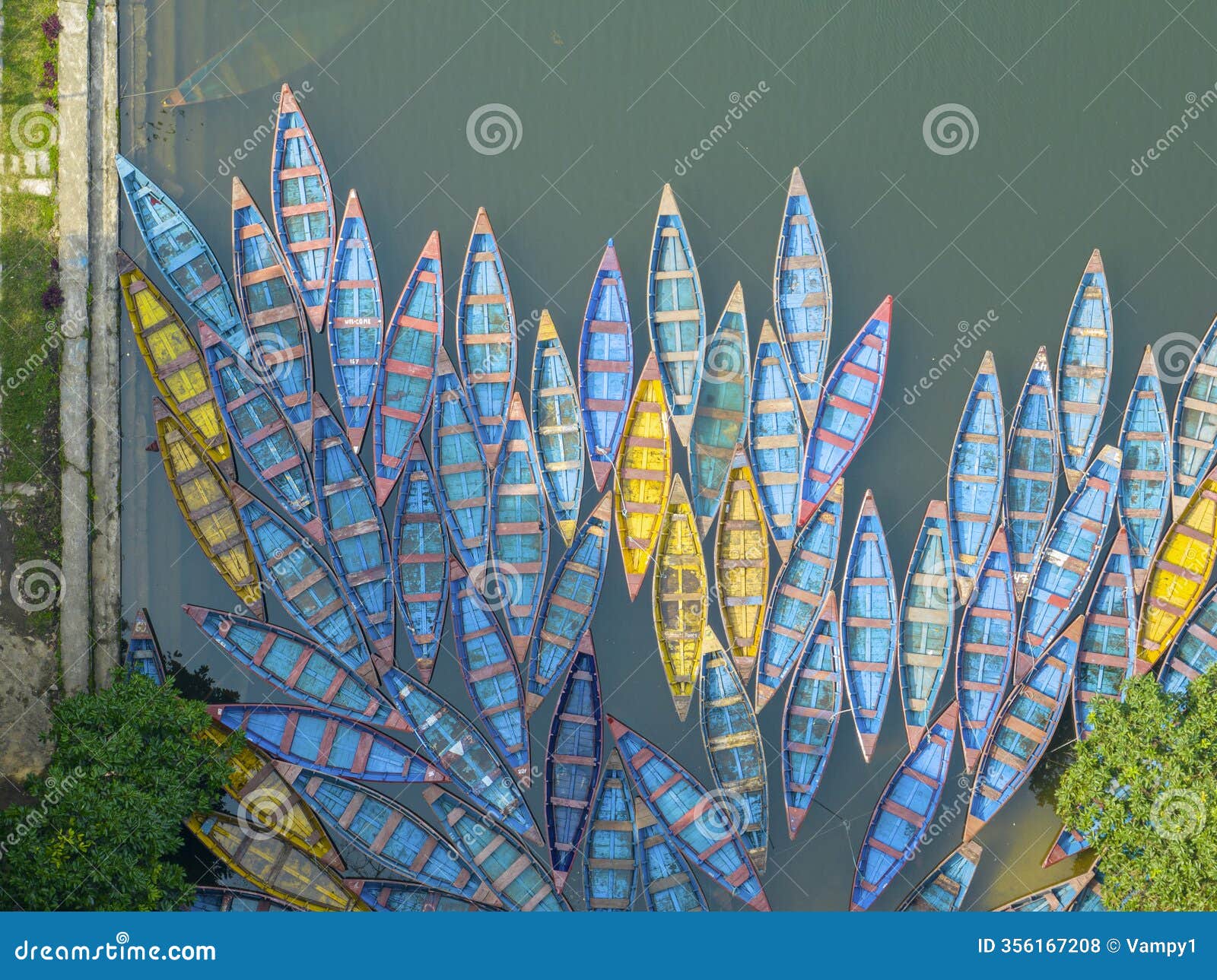 aerial view of typical nepalese boats moored. begnas lake, lekhnath, nepal