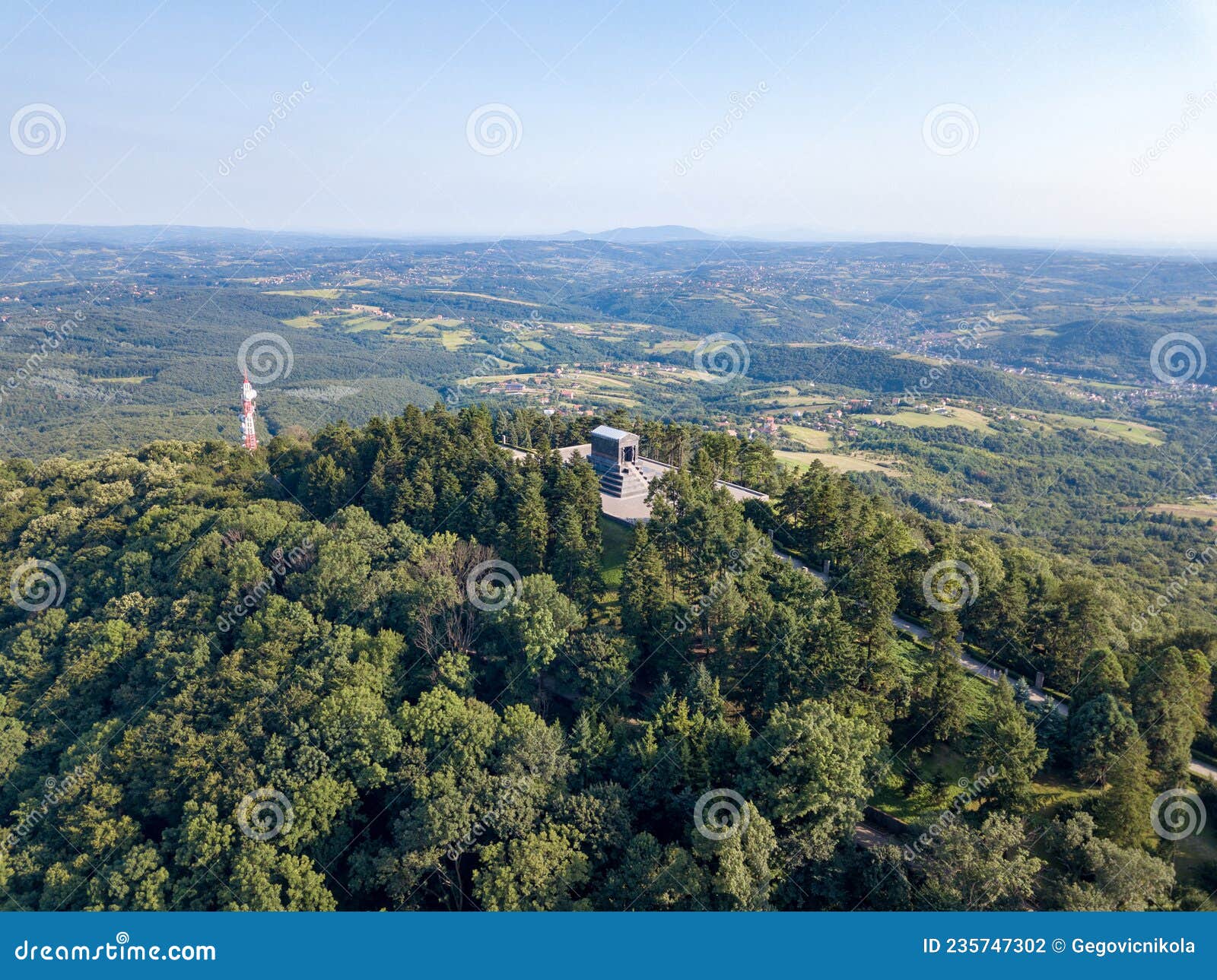 aerial view of the unknown hero monument on top of avala mountain