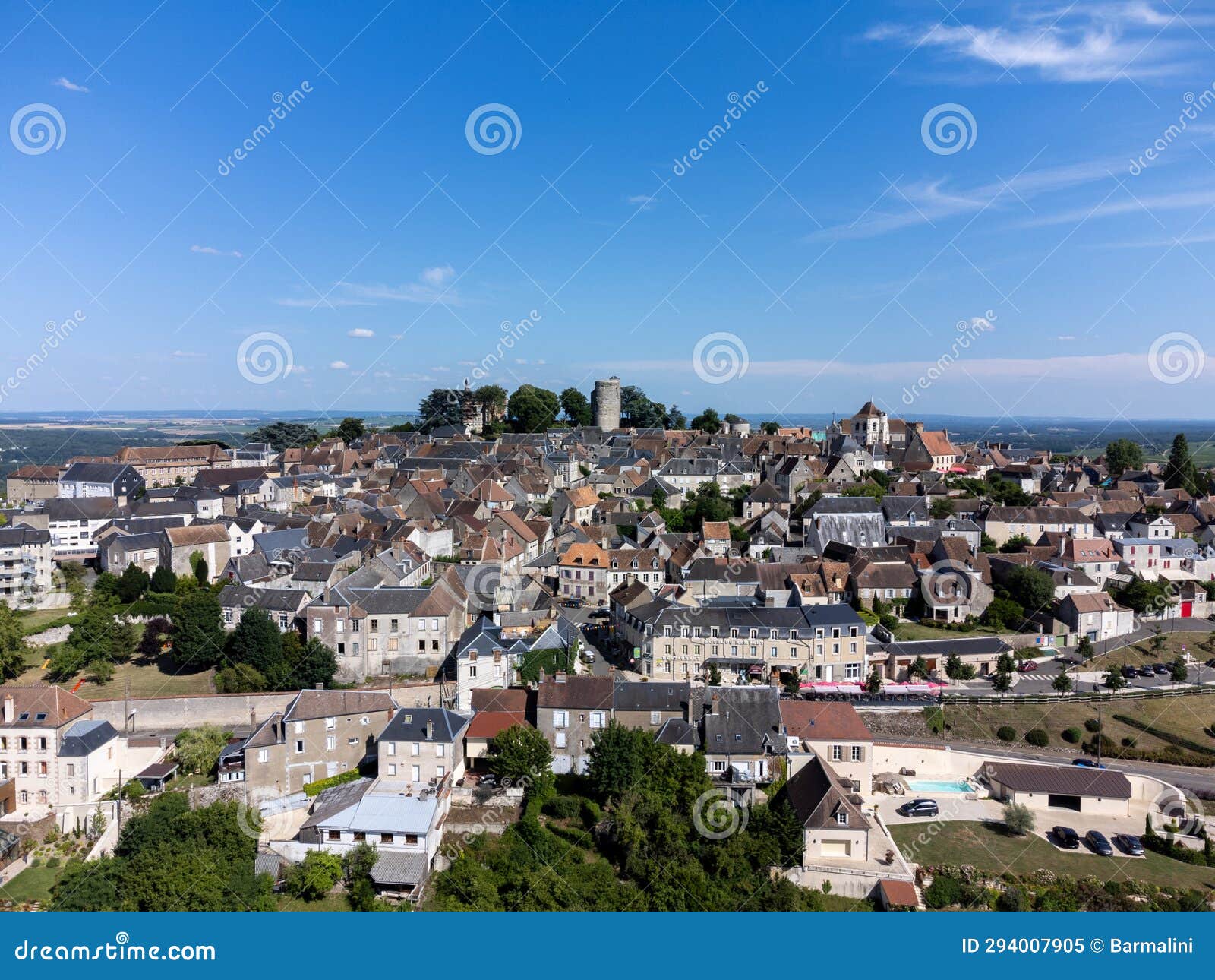 vineyards of chateauneuf du pape appelation with grapes growing on soils with large rounded stones galets roules, lime stones,