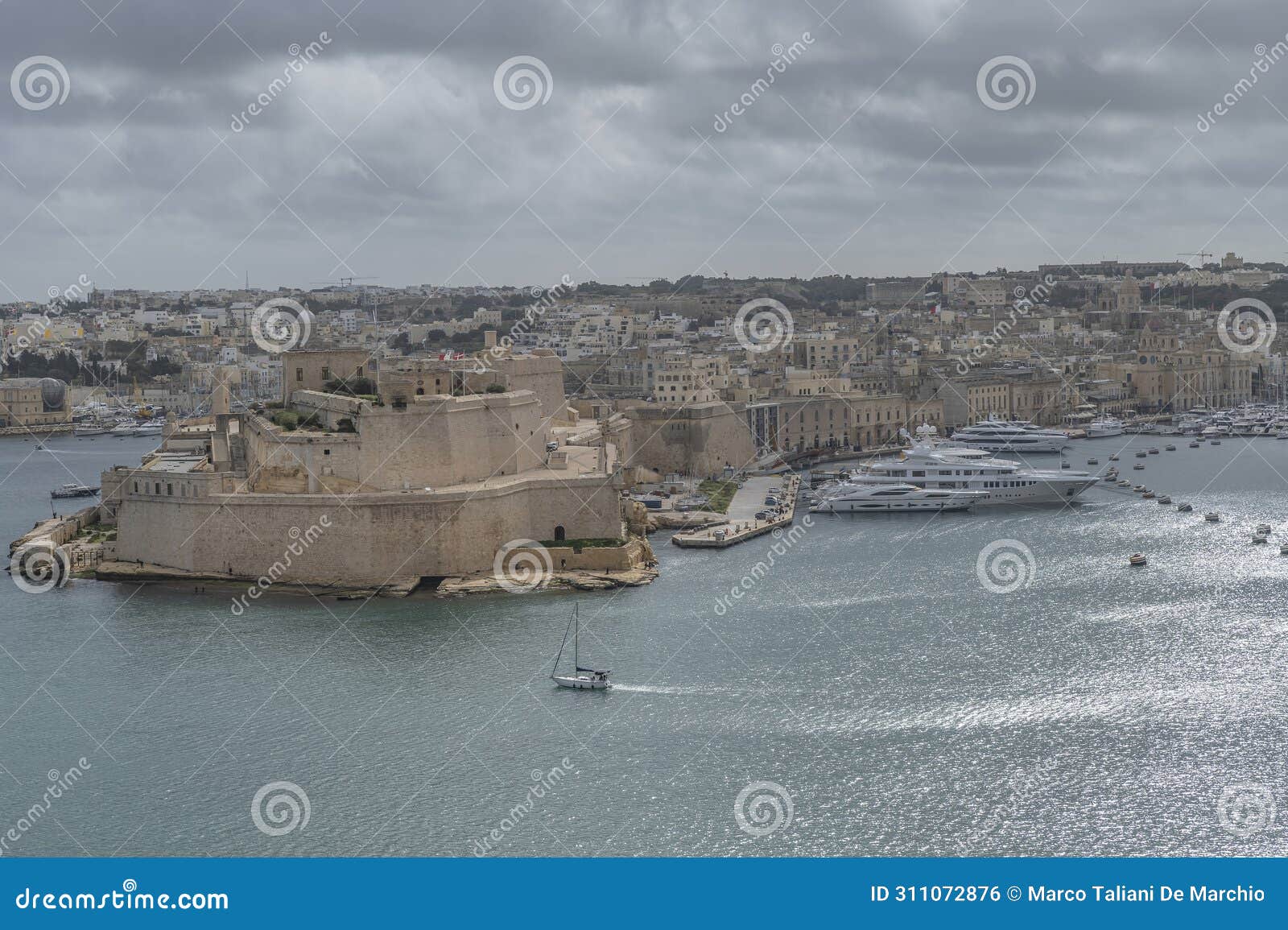 aerial view of vittoriosa, malta, under a dramatic sky