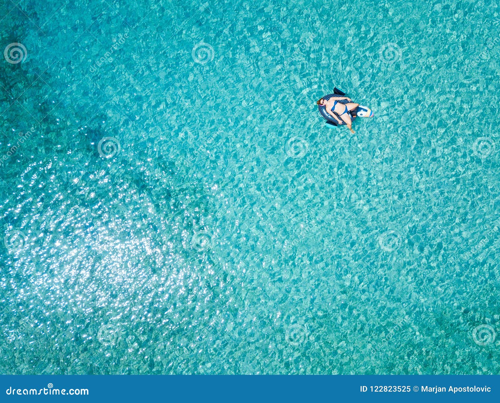 Aerial View of Woman Floating on the Water Mattress in the Sea Stock ...