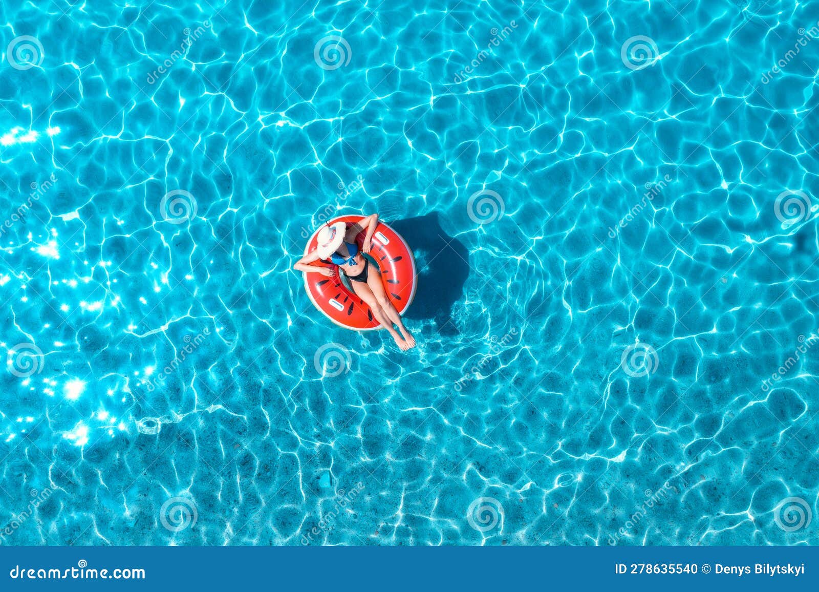 Aerial View of a Young Woman Swimming with Red Swim Ring Stock Photo ...