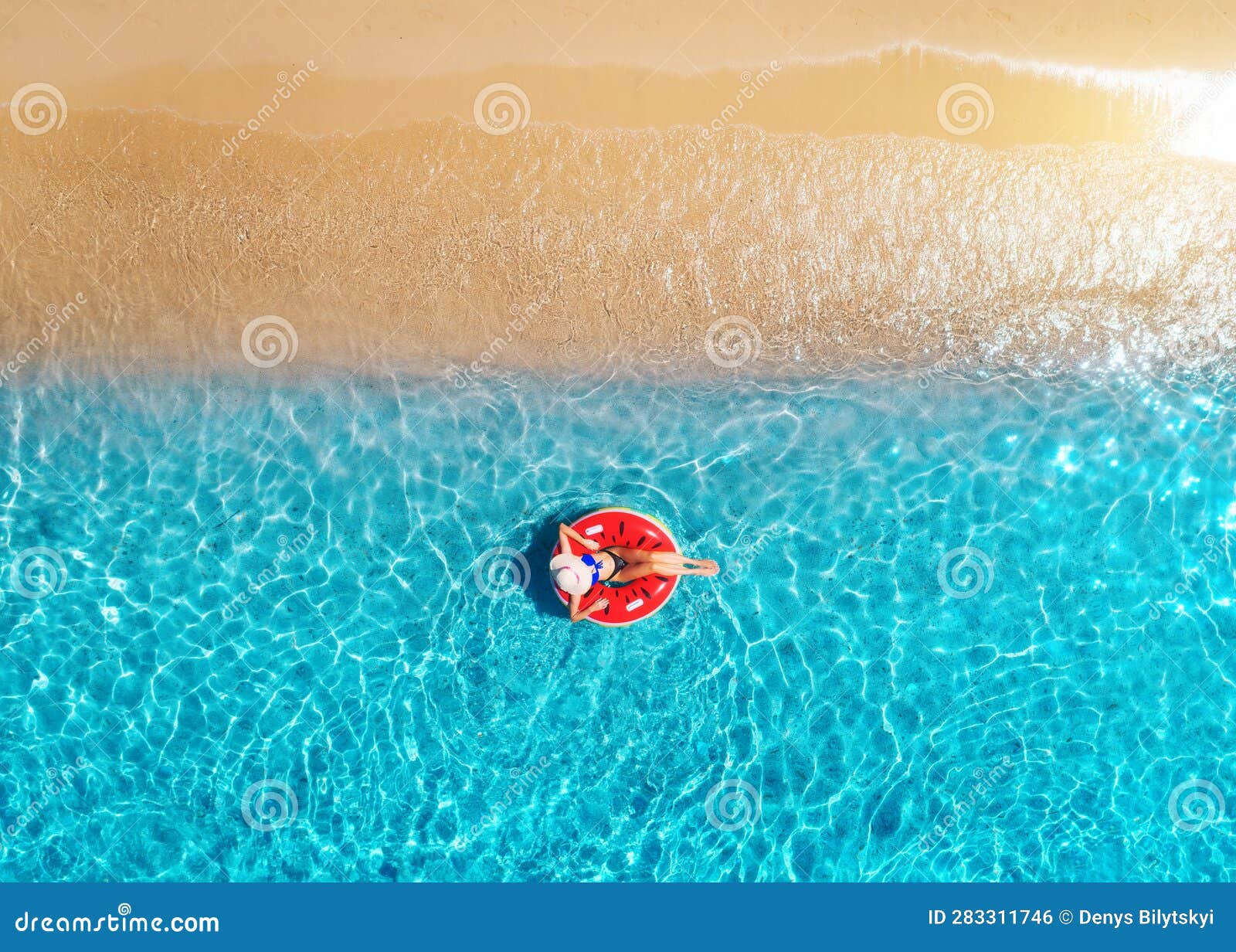 Aerial View of a Young Woman Swimming with Red Swim Ring Stock Photo ...