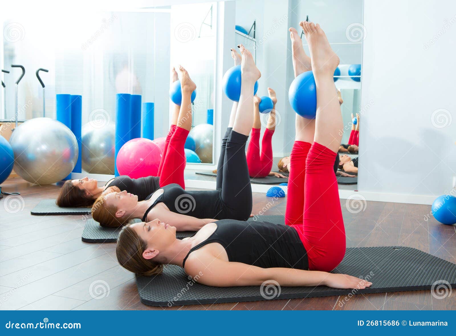 aerobics pilates women with yoga balls