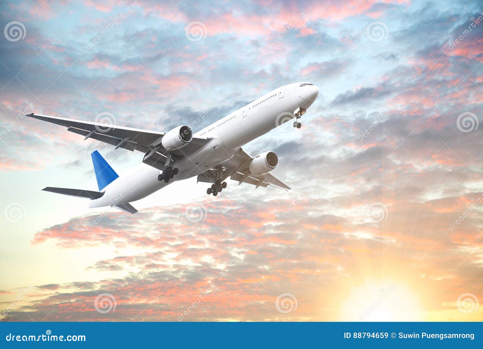 aeroplane flying in sunset sky with beautiful cloud