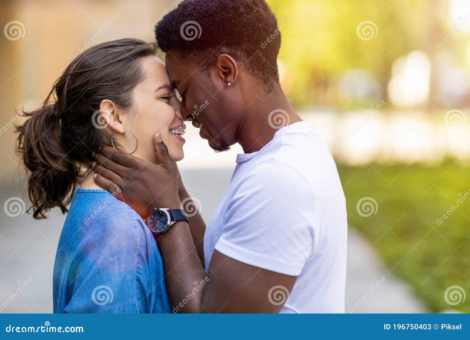 Multiracial Young Couple Kissing Outdoors Stock Image Image Of