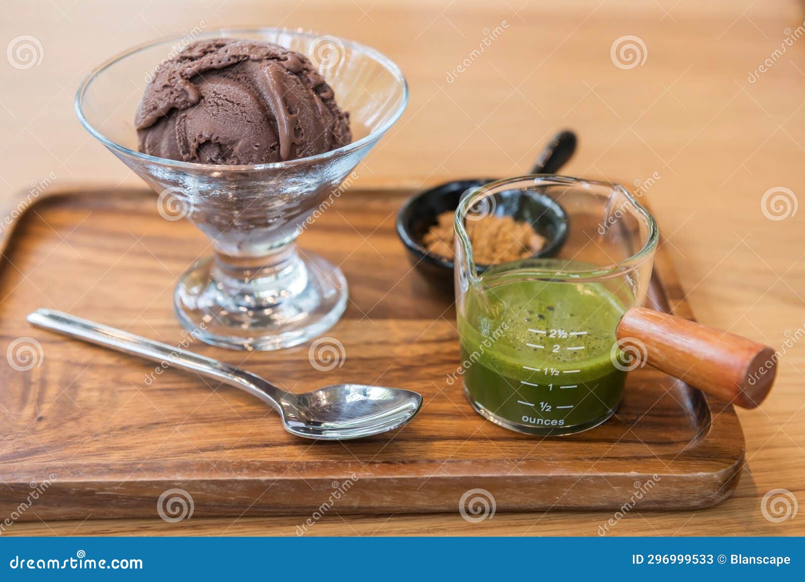 affogato chocolate ice cream with green tea hot fudge on wood table