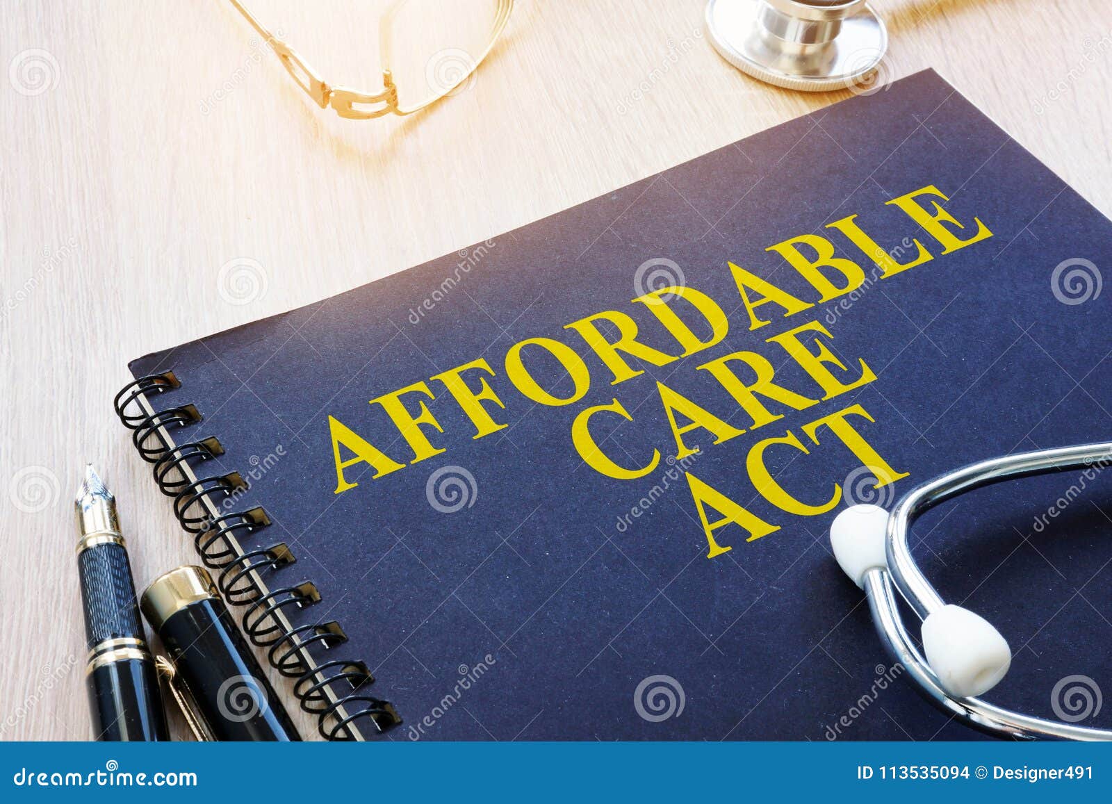 affordable care act aca on a table.