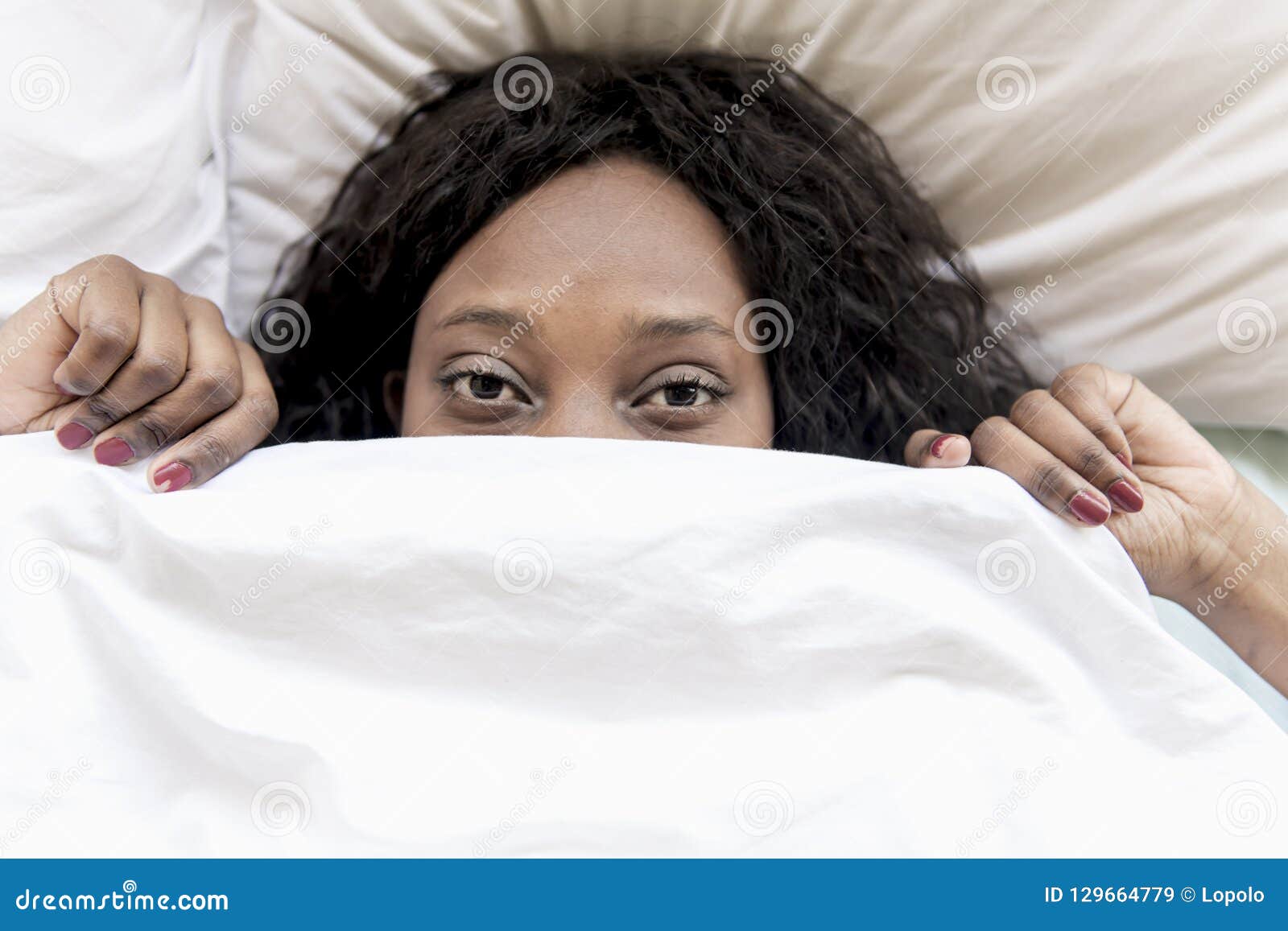 A Afraid Black Woman Under Bed Blanket Stock Image Image Of