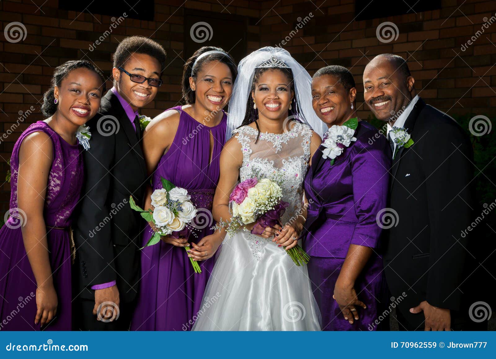 a bride in traditional indian attire poses for a photo with her bridesmaids.  AI-Generated 31256518 Stock Photo at Vecteezy