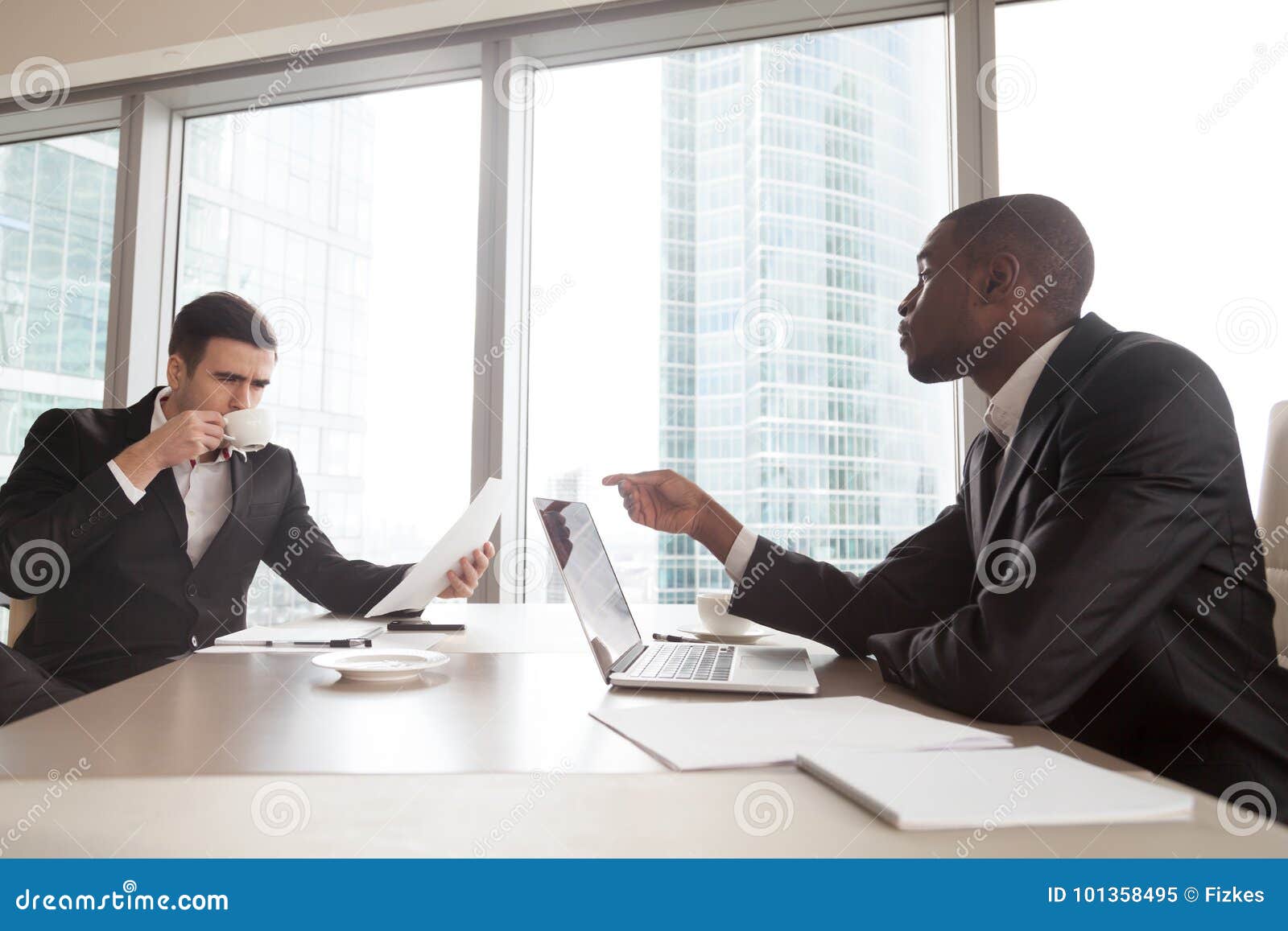 Black Financial Consultant Talking With Investor Stock Image Image - african american businessman conducting negotiations explaining terms of contract discussing financial plans or results with caucasian partner