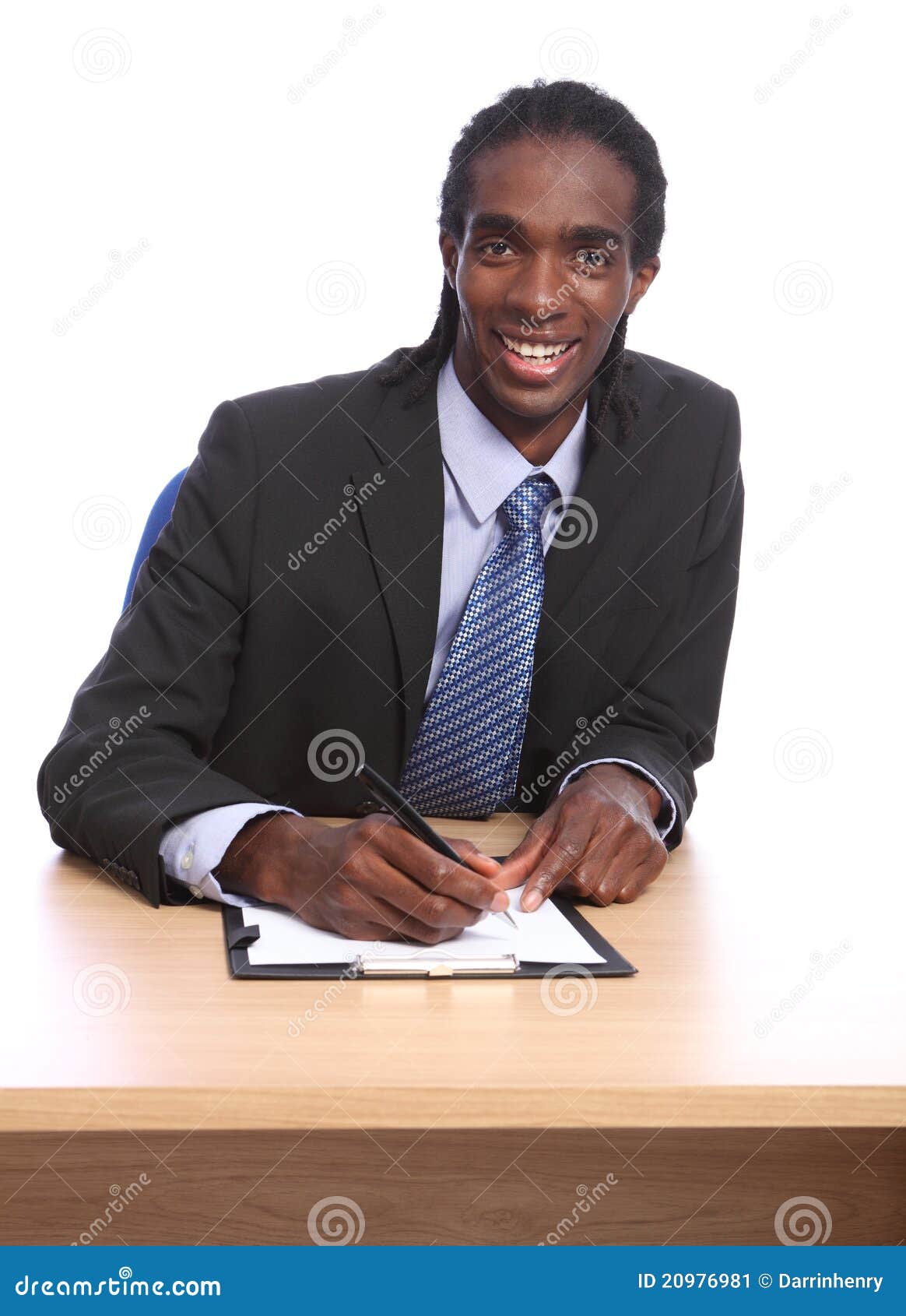 african american businessman signing document