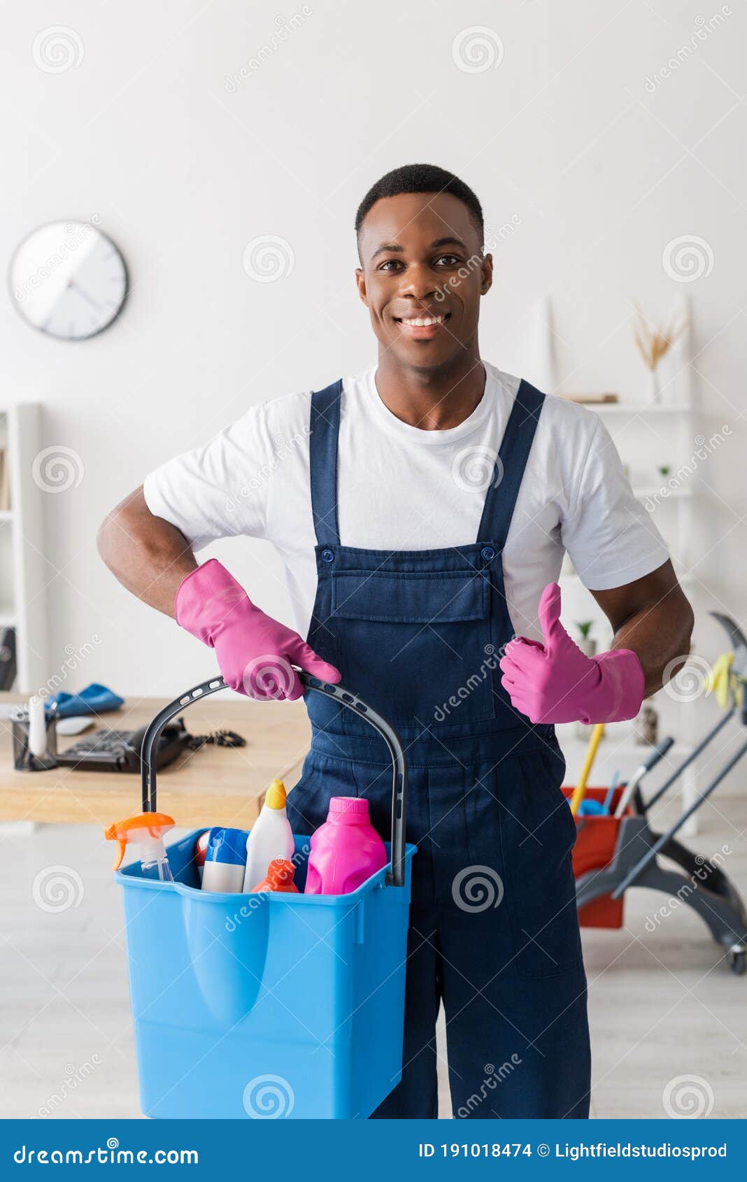 young smiling african american cleaners with cleaning equipment working  together Stock Photo - Alamy