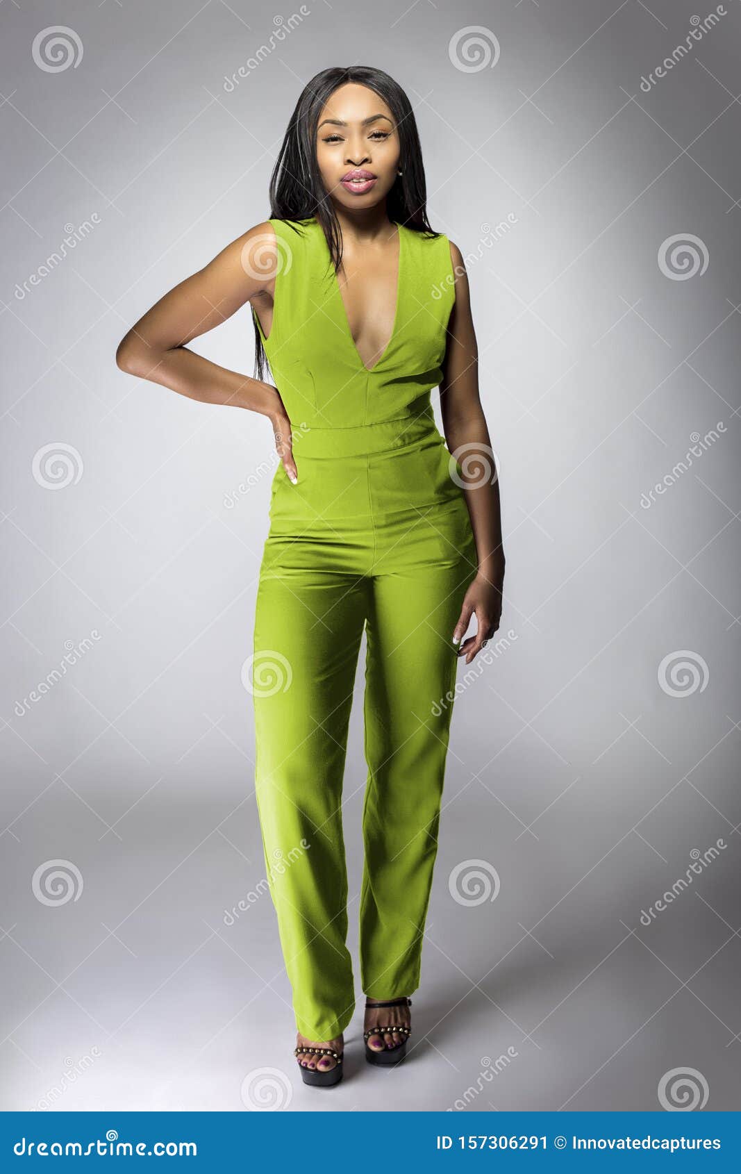African American Fashion Model Wearing a Lime Jumpsuit Stock Image - Image of fall, jumpsuit: 157306291